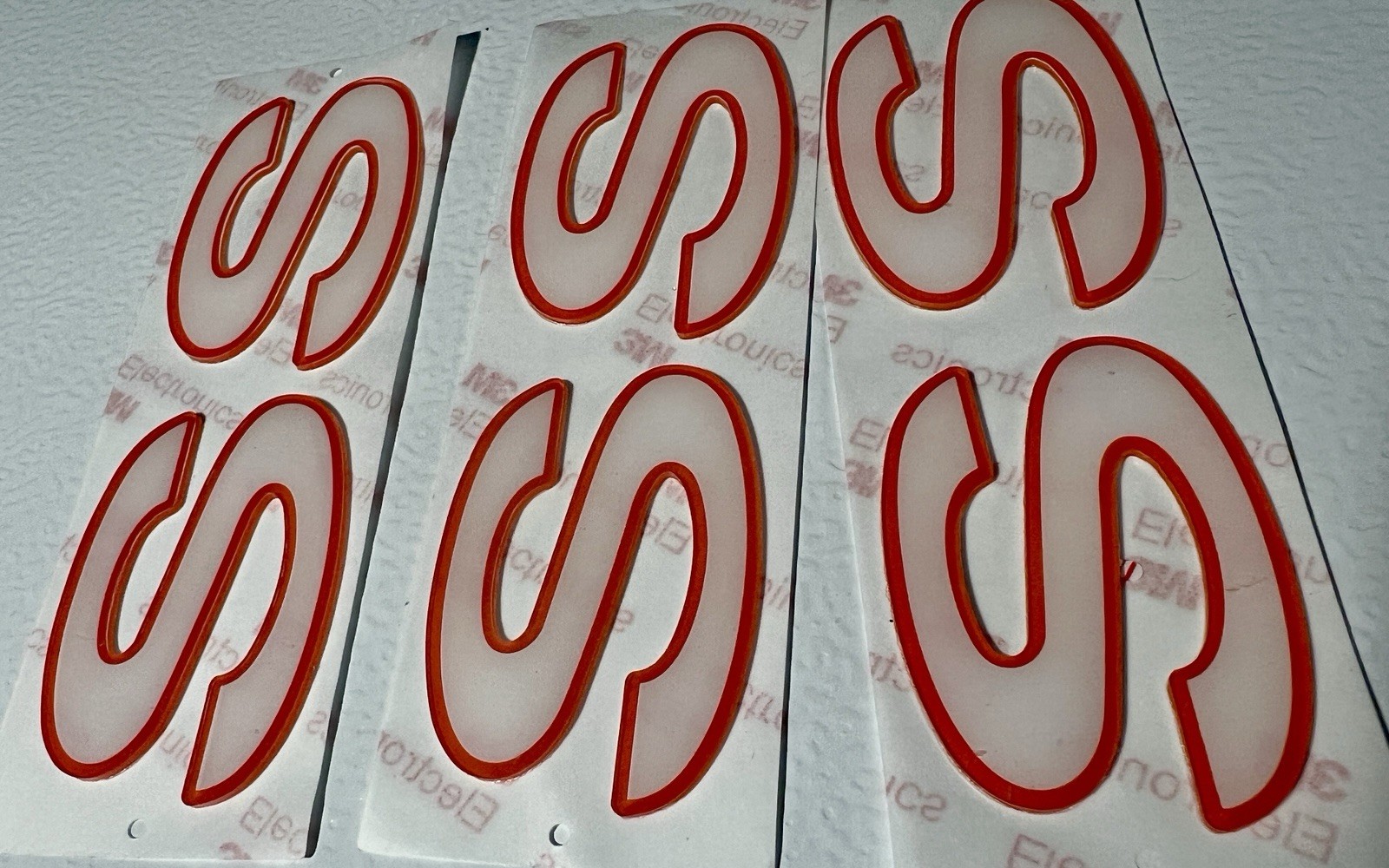 1997 Camaro SS 30th Anniversary Fender/Rear Emblem set White w/ Orange Outline 1997 Camaro SS 30th Anniversary Fender/Rear Emblem set White w/ Orange Outline