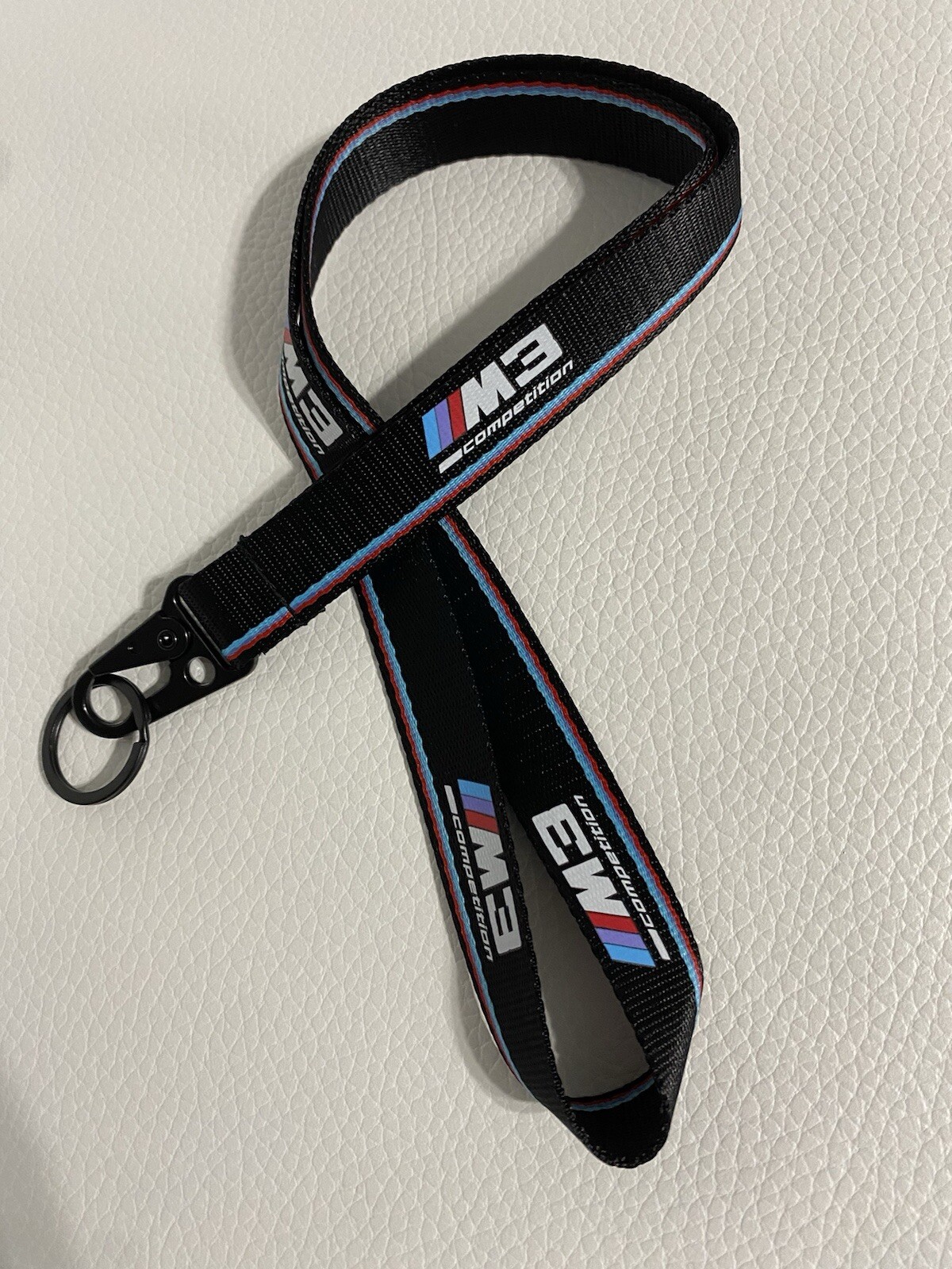 BMW M3 Competition Keychain Lanyard – Seatbelt-Inspired Design, 17 in L x 1 in W BMW M3 Competition Keychain Lanyard – Seatbelt-Inspired Design, 17 in L x 1 in W