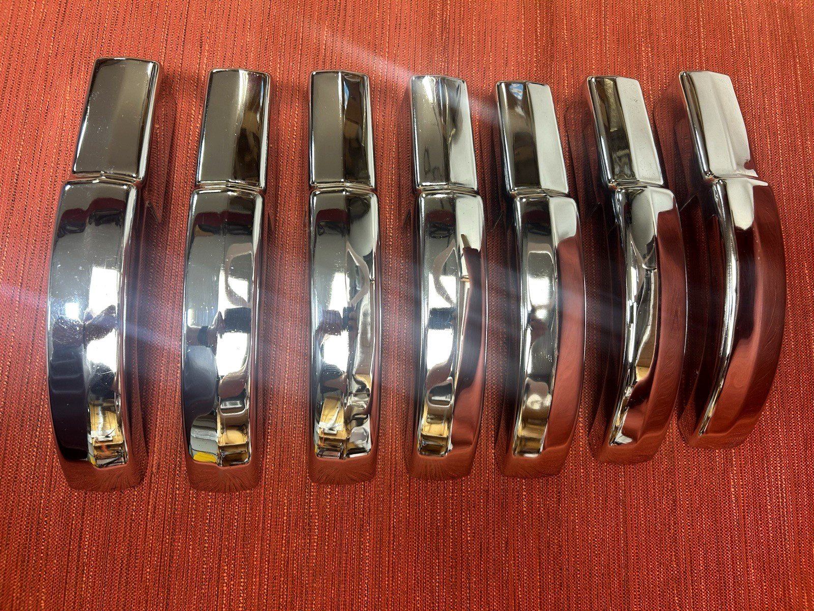 Complete set of 7 NOS 1952-1953 Mercury accessory lower grille trim pieces, Merc Complete set of 7 NOS 1952-1953 Mercury accessory lower grille trim pieces, Merc