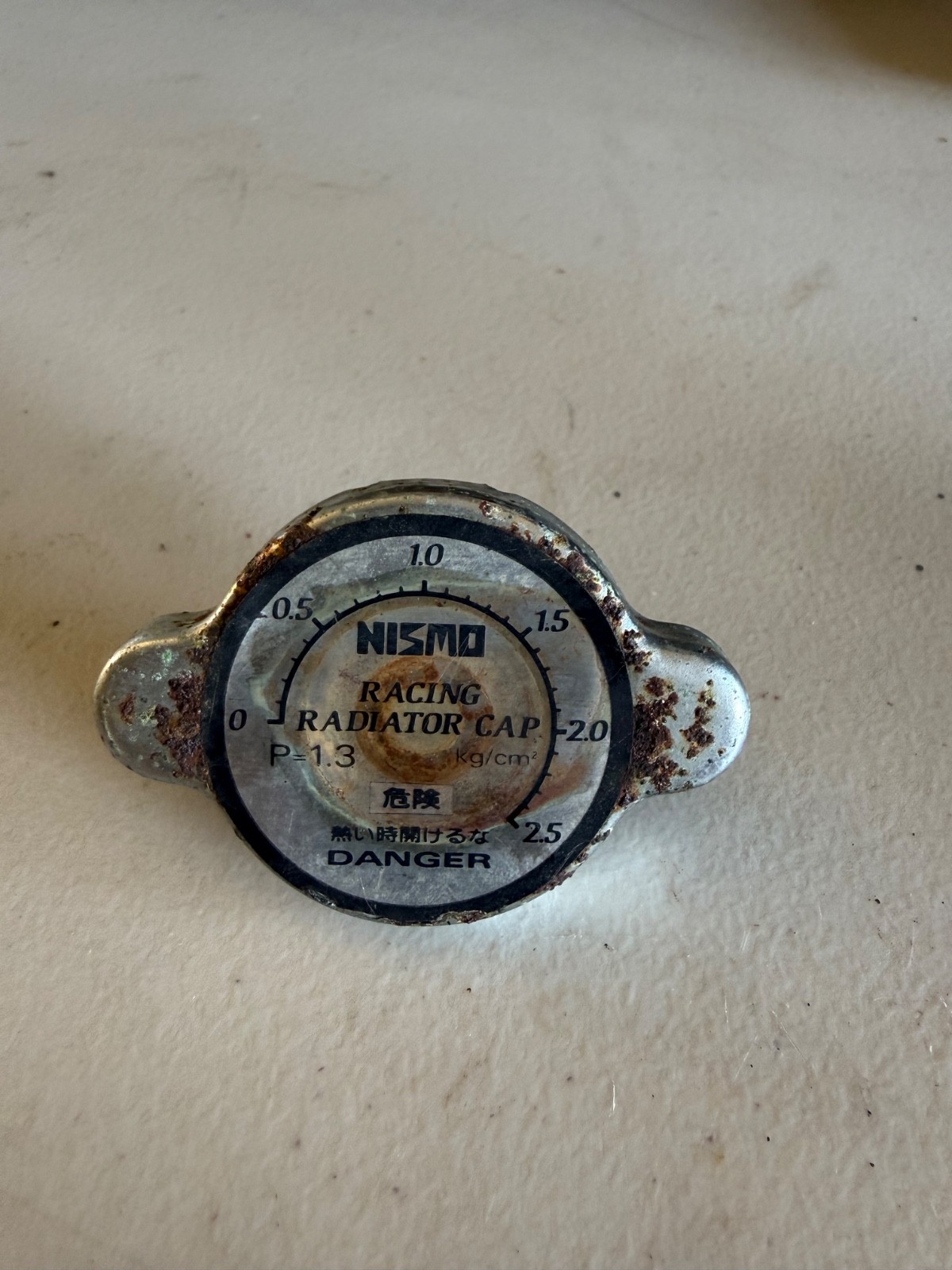 rare old logo Nismo vintage radiator cap rare old logo Nismo vintage radiator cap