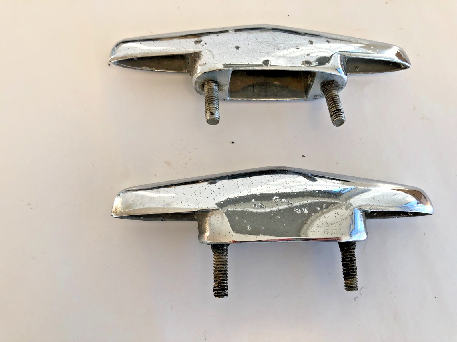 PAIR 1958 BUICK SPECIAL TRUNK HANDLE EMBLEM BRACKETS WITH ORIGINAL BOLTS OEM GM
