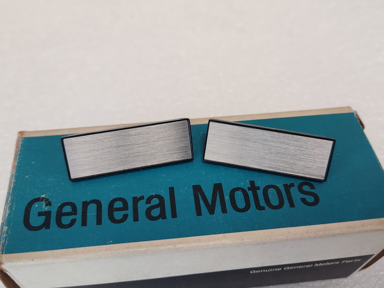 NOS 1974-78 Chevy Cadillac Olds Door Assist Strap Escutcheon Cover Pair 1653249