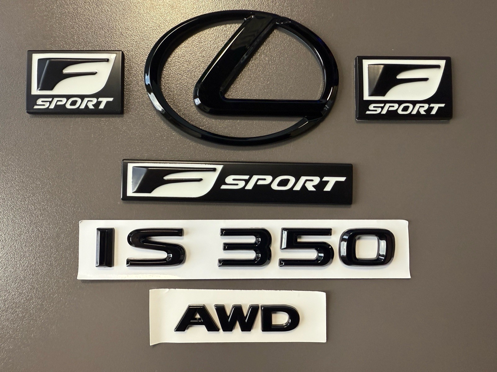 Gloss Black Emblem Badge Logo Trunk & Fender kit fits Lexus IS350 2021 to 2025 Gloss Black Emblem Badge Logo Trunk & Fender kit fits Lexus IS350 2021 to 2025