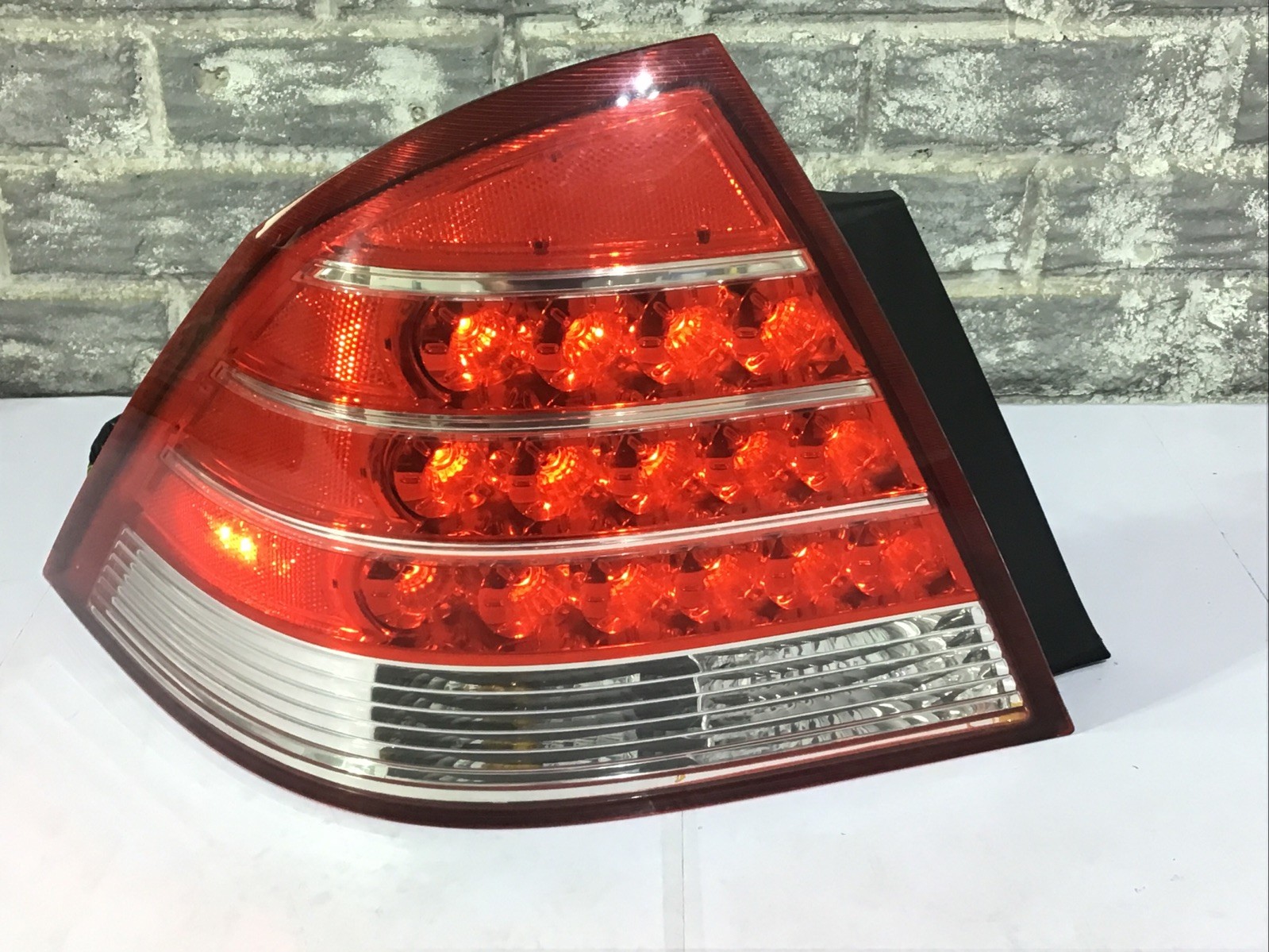 2005-2007 Mercury Montego Tail Light Left (driver Side) TESTED, OEM, COMPLETE. 2005-2007 Mercury Montego Tail Light Left (driver Side) TESTED, OEM, COMPLETE.