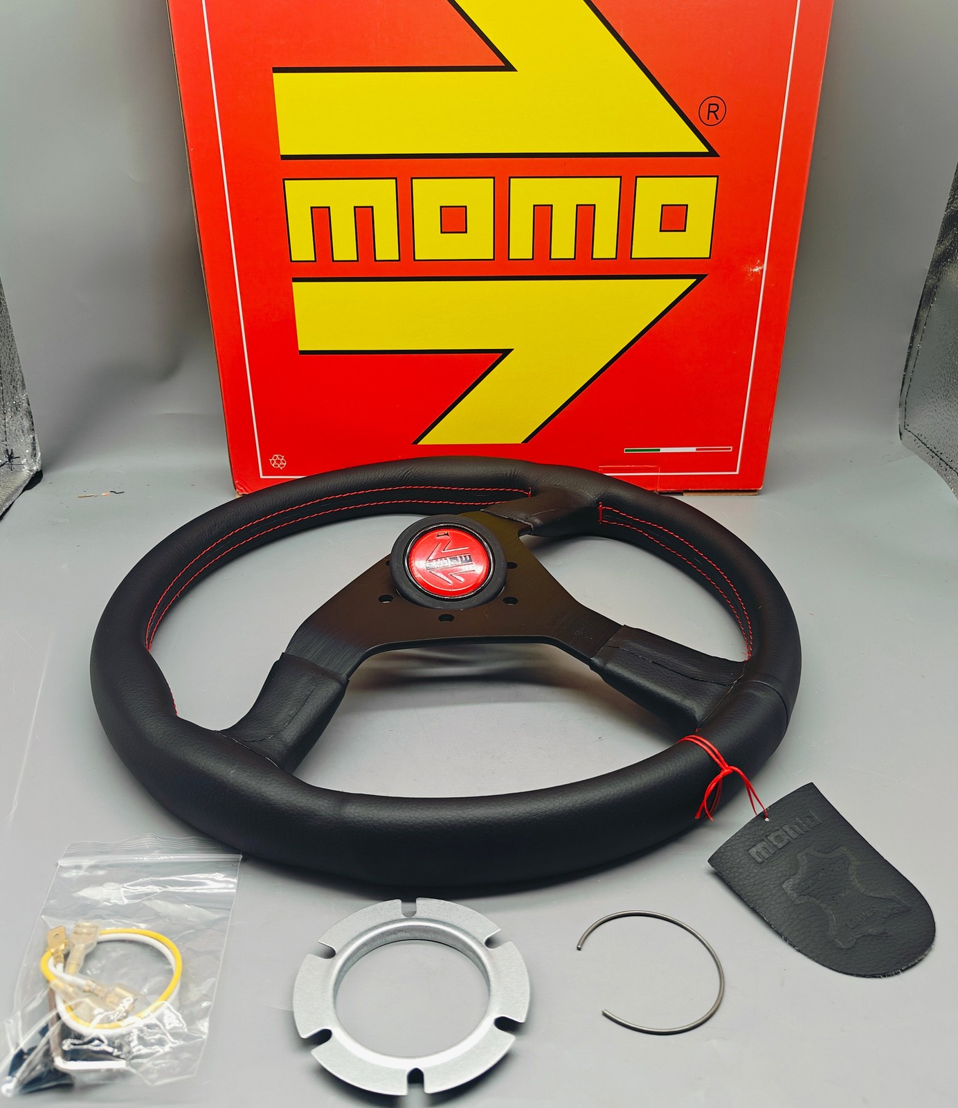 MOMO MonteCarlo 14'350mm Real Leather Thickened Spoke Sport Steering Wheel new MOMO MonteCarlo 14'350mm Real Leather Thickened Spoke Sport Steering Wheel new
