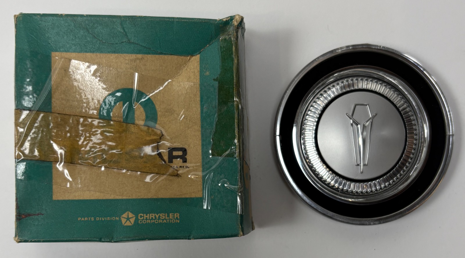New Old Stock Horn Ornament for 1962-66 Plymouth Valiant Models Mopar #2768271 New Old Stock Horn Ornament for 1962-66 Plymouth Valiant Models Mopar #2768271