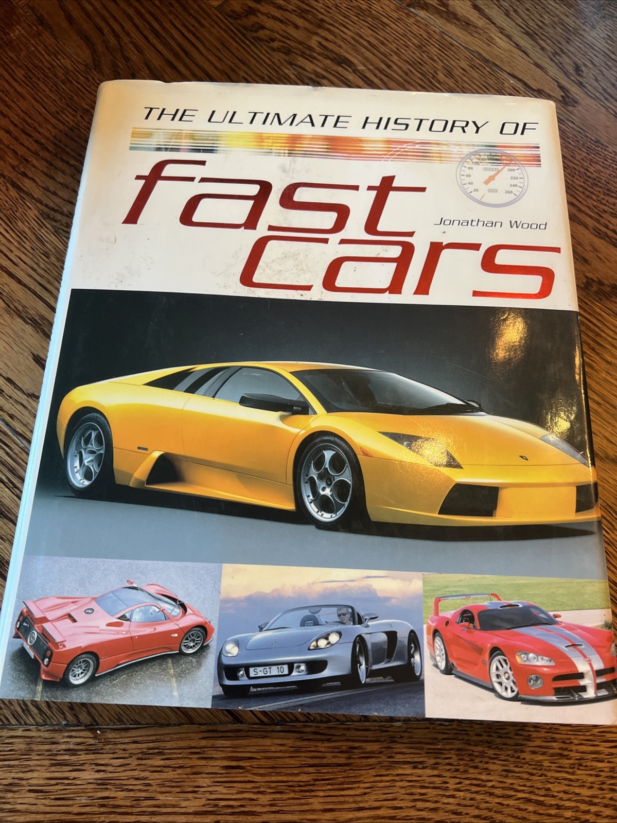 The Ultimate History of Fast Cars by Jonathan Wood : 1-40541-593-2