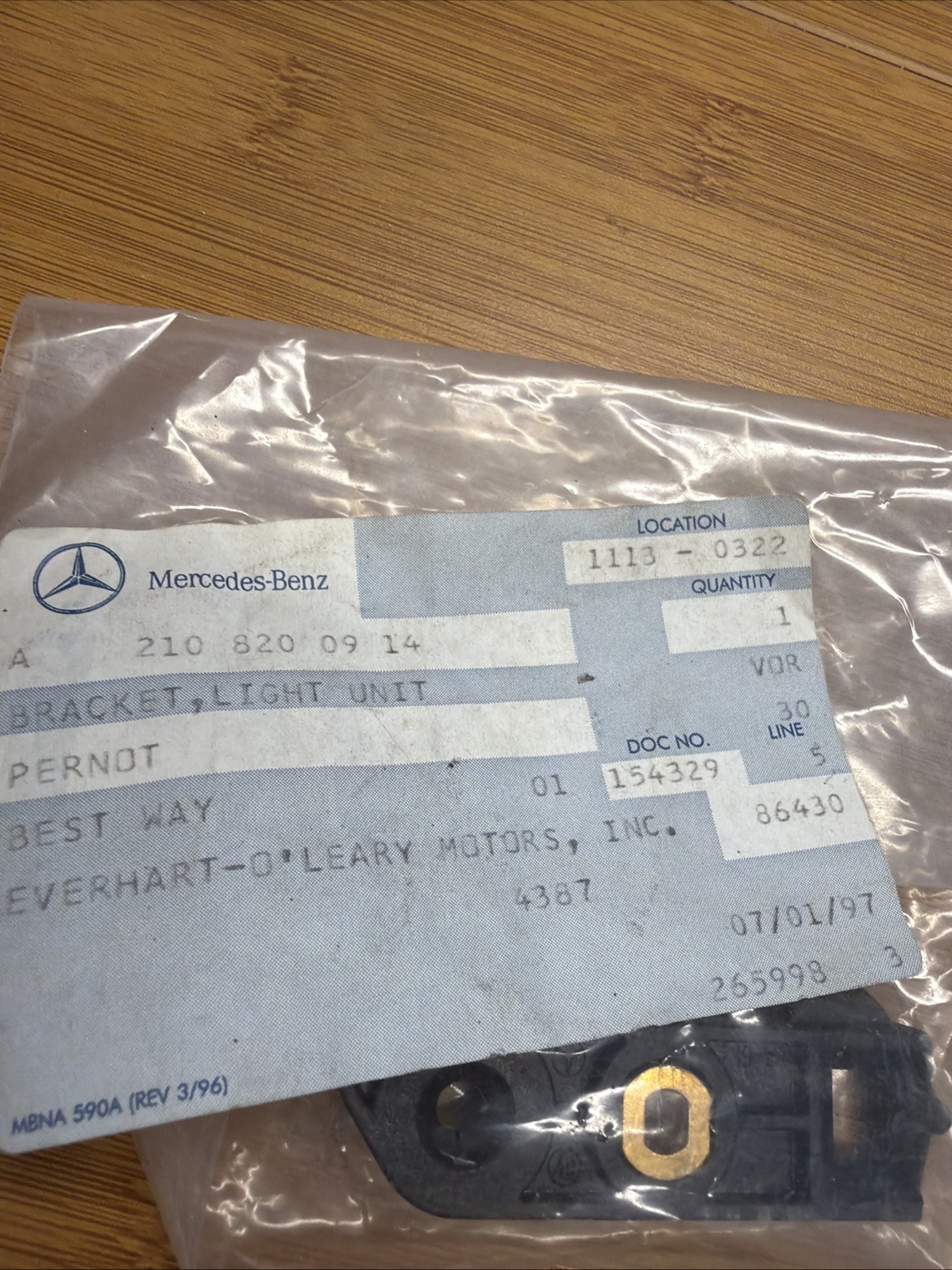 1996-1999 Mercedes W210 E-Class Headlight Bracket OEM A2108200914 NOS
