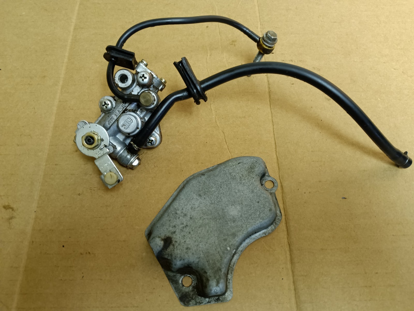 1981 Suzuki TS125 Oil Pump Genuine Mikuni Japan OEM With Oil Lines 1981 Suzuki TS125 Oil Pump Genuine Mikuni Japan OEM With Oil Lines