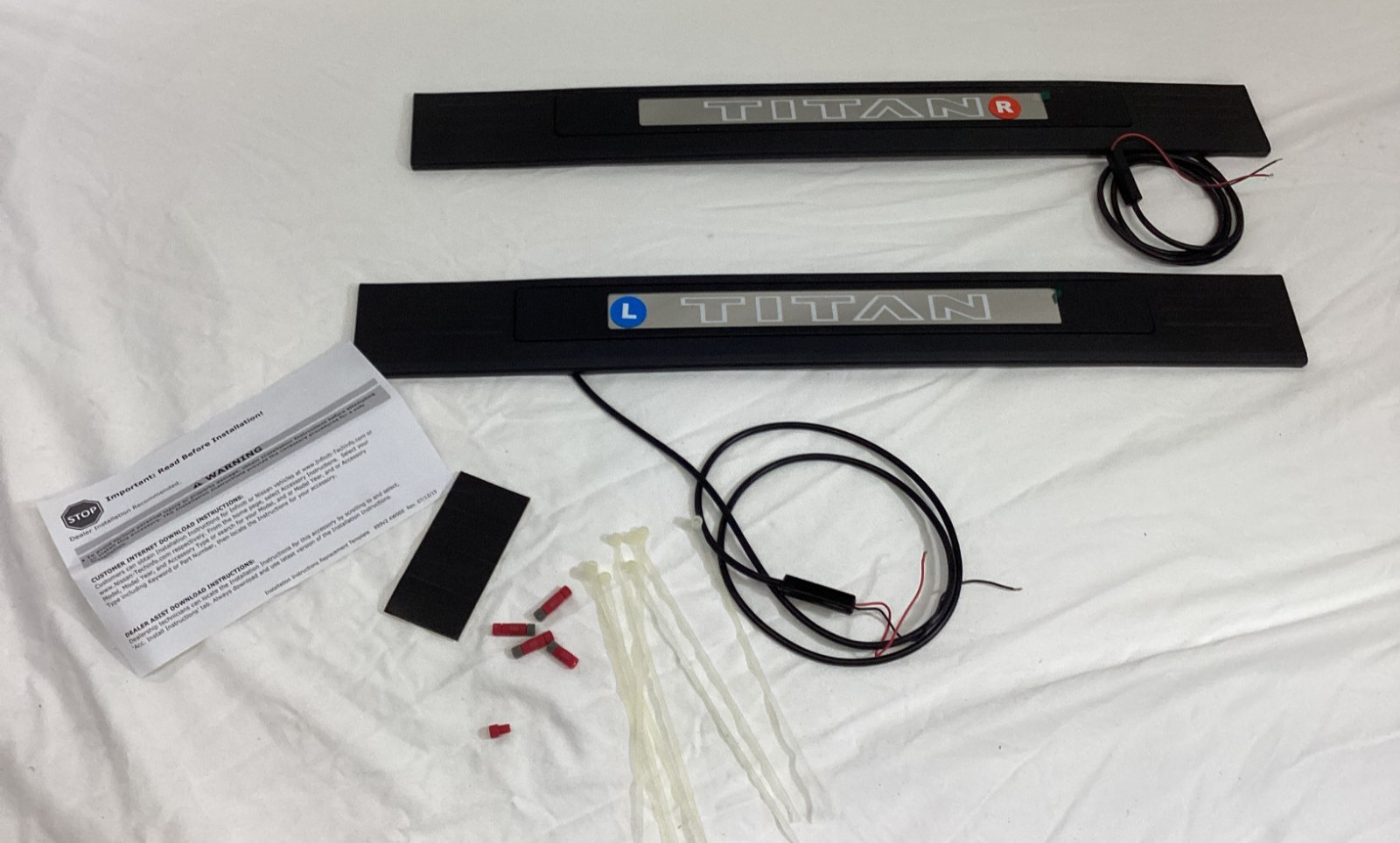 999G6-W8TN0 New OEM Illuminated Kick Plates (Fits: 2016-2024 Nissan Titan)