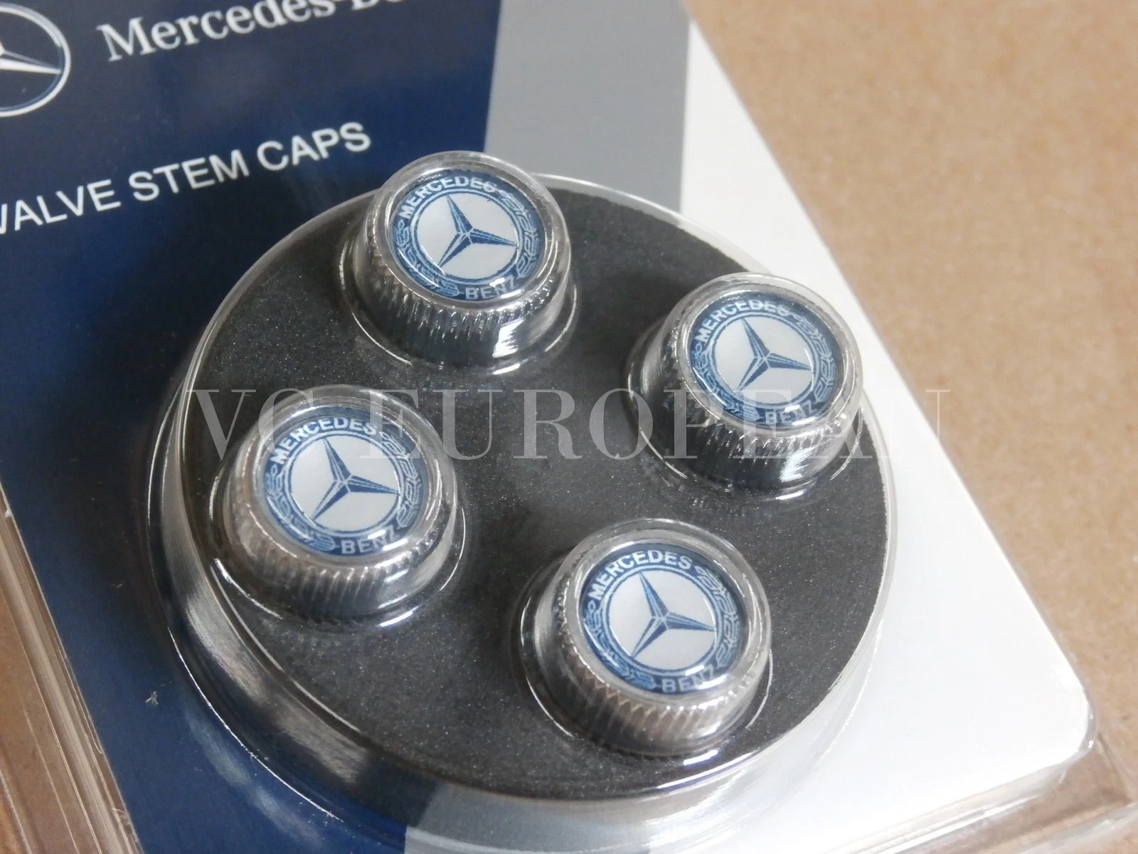 Mercedes-Benz Genuine Tire Valve Stem Cap Set, Laurel Blue on Silver Caps OEM 