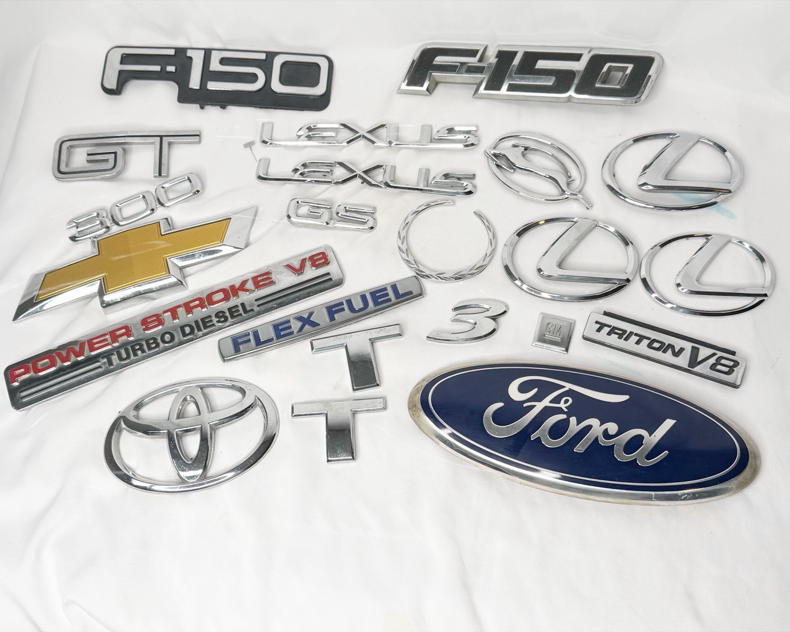 Lot Of 22 OEM Car Truck Emblems Ford Lexus Toyota Chevrolet GM Triton V8