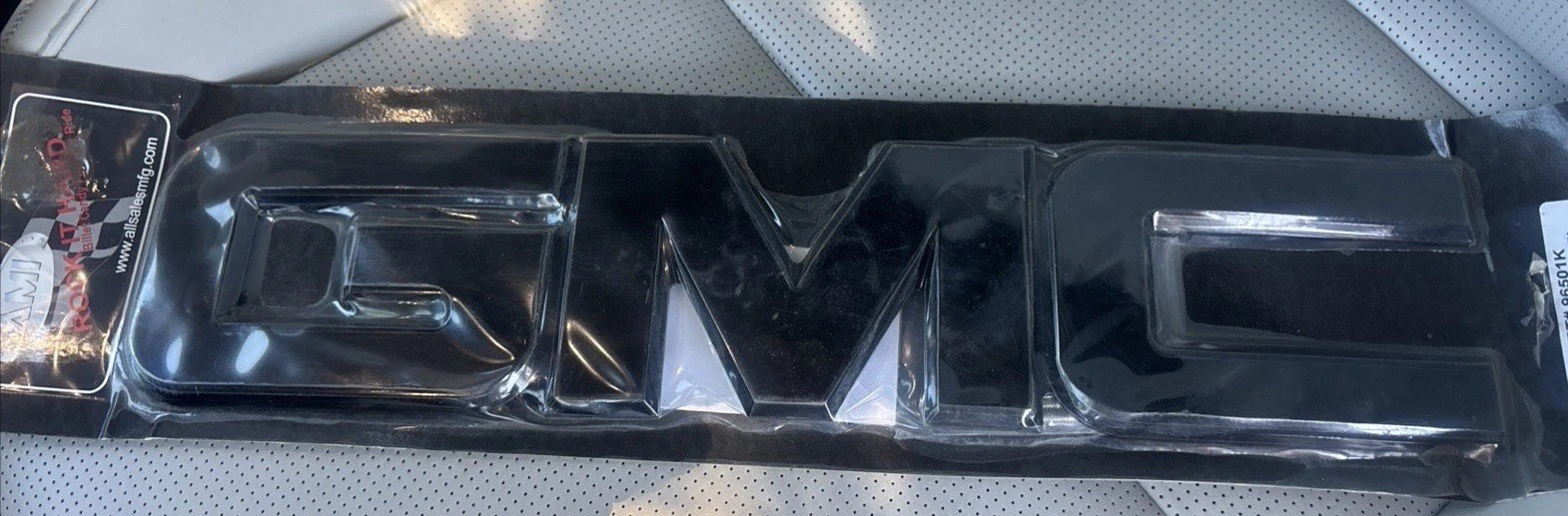 Fits: 2008--2010 GMC Serra Front Billet Grille Emblem BLACK 96501K AMI USA Fits: 2008--2010 GMC Serra Front Billet Grille Emblem BLACK 96501K AMI USA