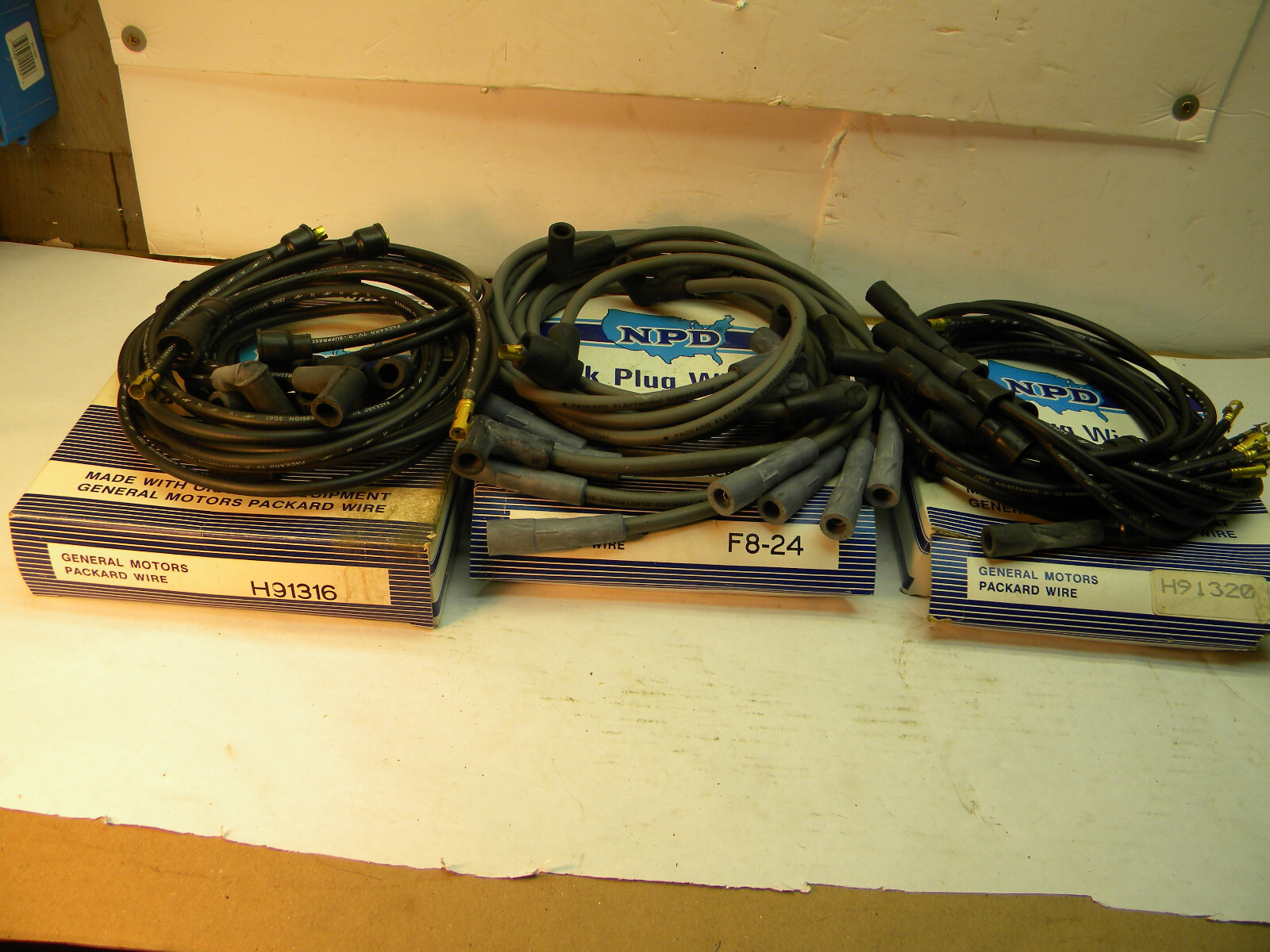 3 Spark Plug wire sets NOS: H91320; F8-24; H91316; Auto Tune Up.