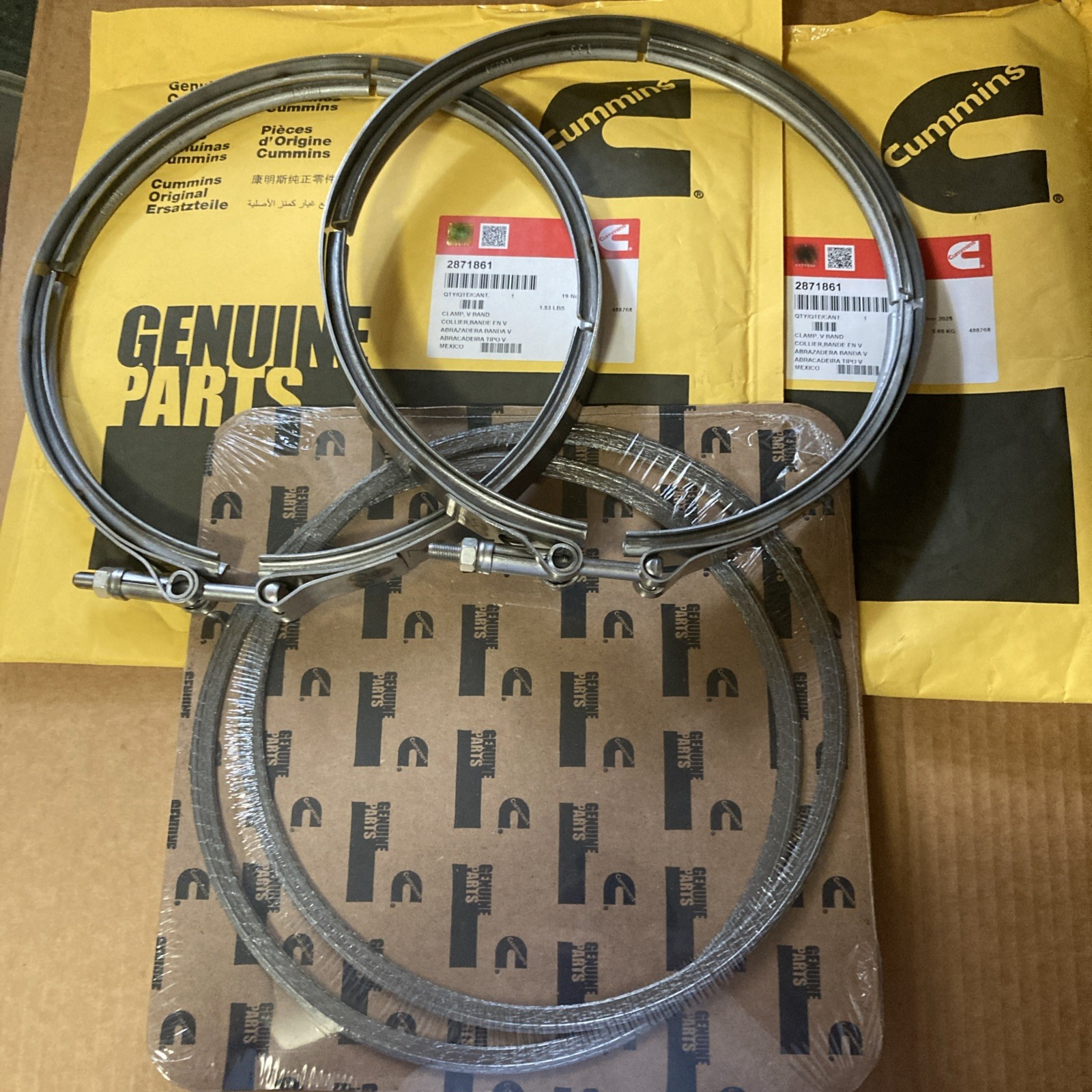 QTY 2 EA GENUINE 2871861/2871451 Cummins DPF Filter CLAMP and GASKET Kit. QTY 2 EA GENUINE 2871861/2871451 Cummins DPF Filter CLAMP and GASKET Kit.