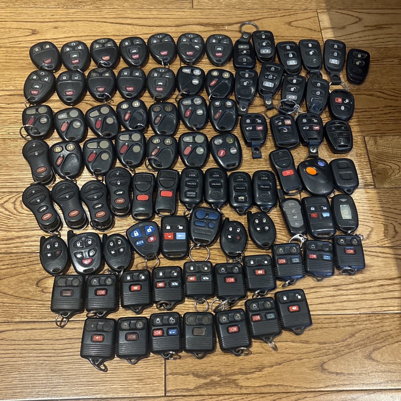 HUGE LOT of 84 OEM REMOTES GM Hyundai Ford Toyota Nissan key fobs  all OEM rare 