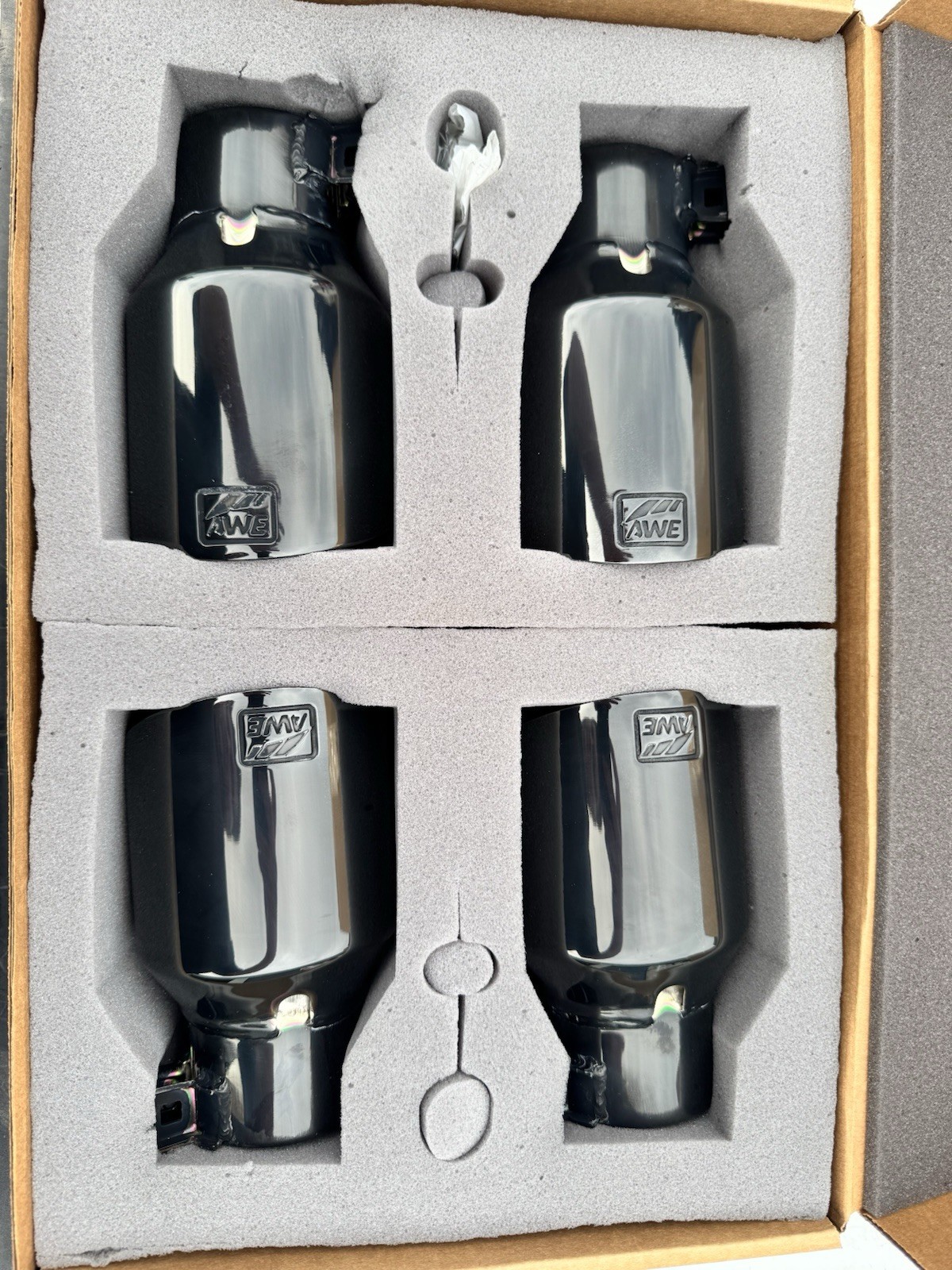 4” AWE Black Diamond exhaust tips 2.5” inlet