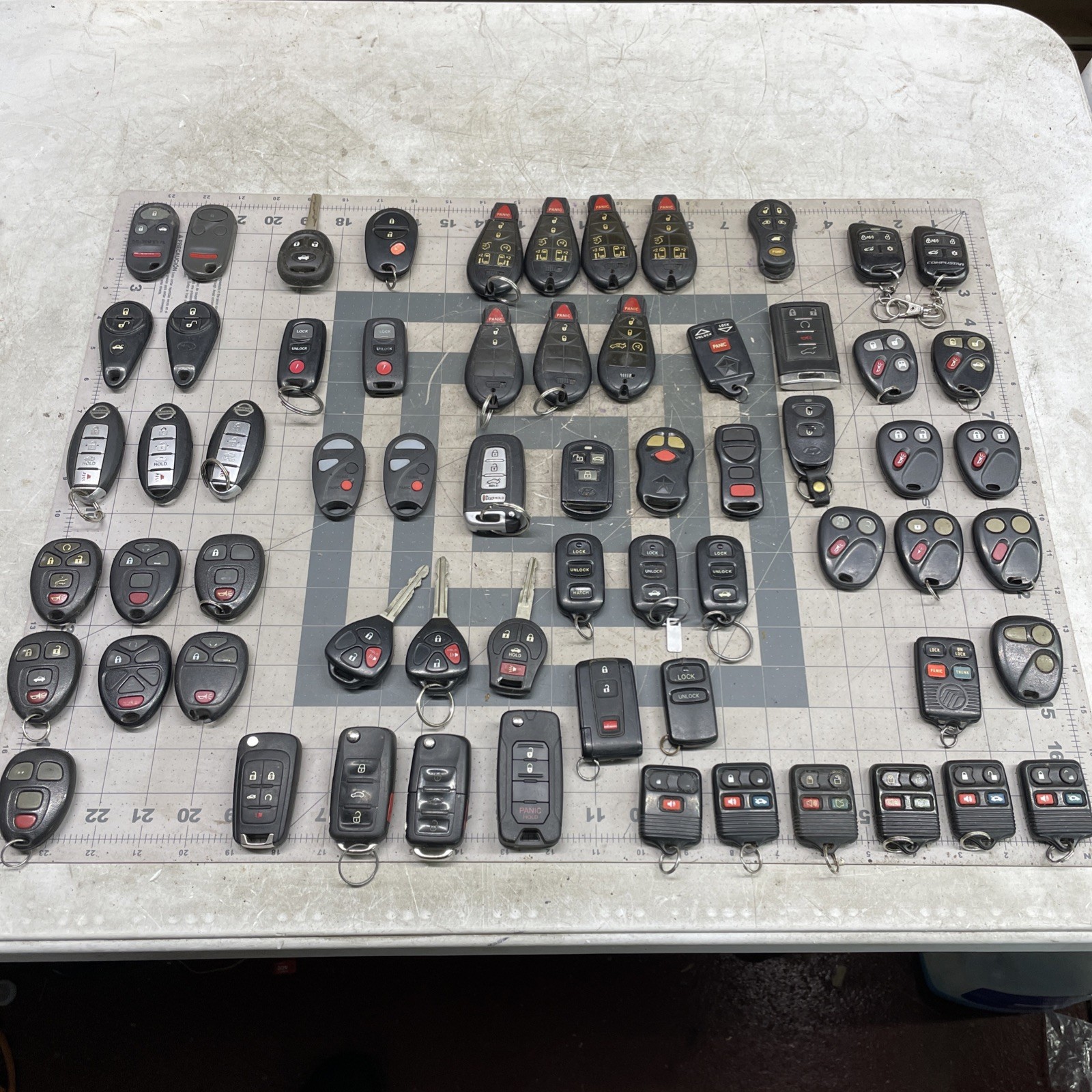 Lot of 63 Keyless Entry Remote Fobs MIXED BAG SEE PHOTOS Lot of 63 Keyless Entry Remote Fobs MIXED BAG SEE PHOTOS