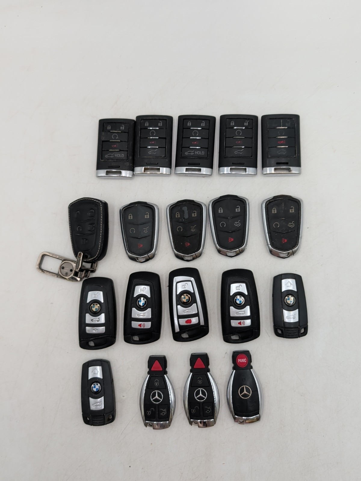 Lot Of 19 - (10) Cadillac Smart Key Fob Remote / (6) BMW Key Fob/  (3) Mercedes 