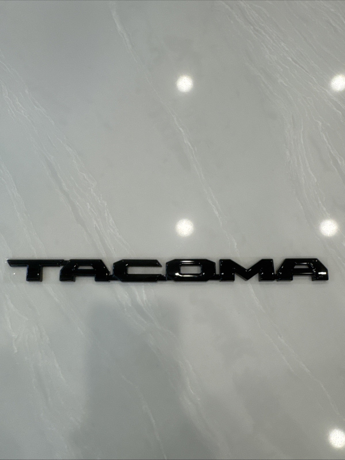 OEM Geniune Toyota Tacoma RH Nightshade 75427-04050 Gloss Black Door Emblem
