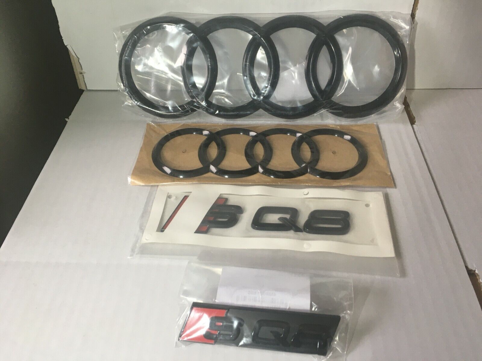 Audi SQ8 Rings Front Rear Emblems Glossy Black Original 