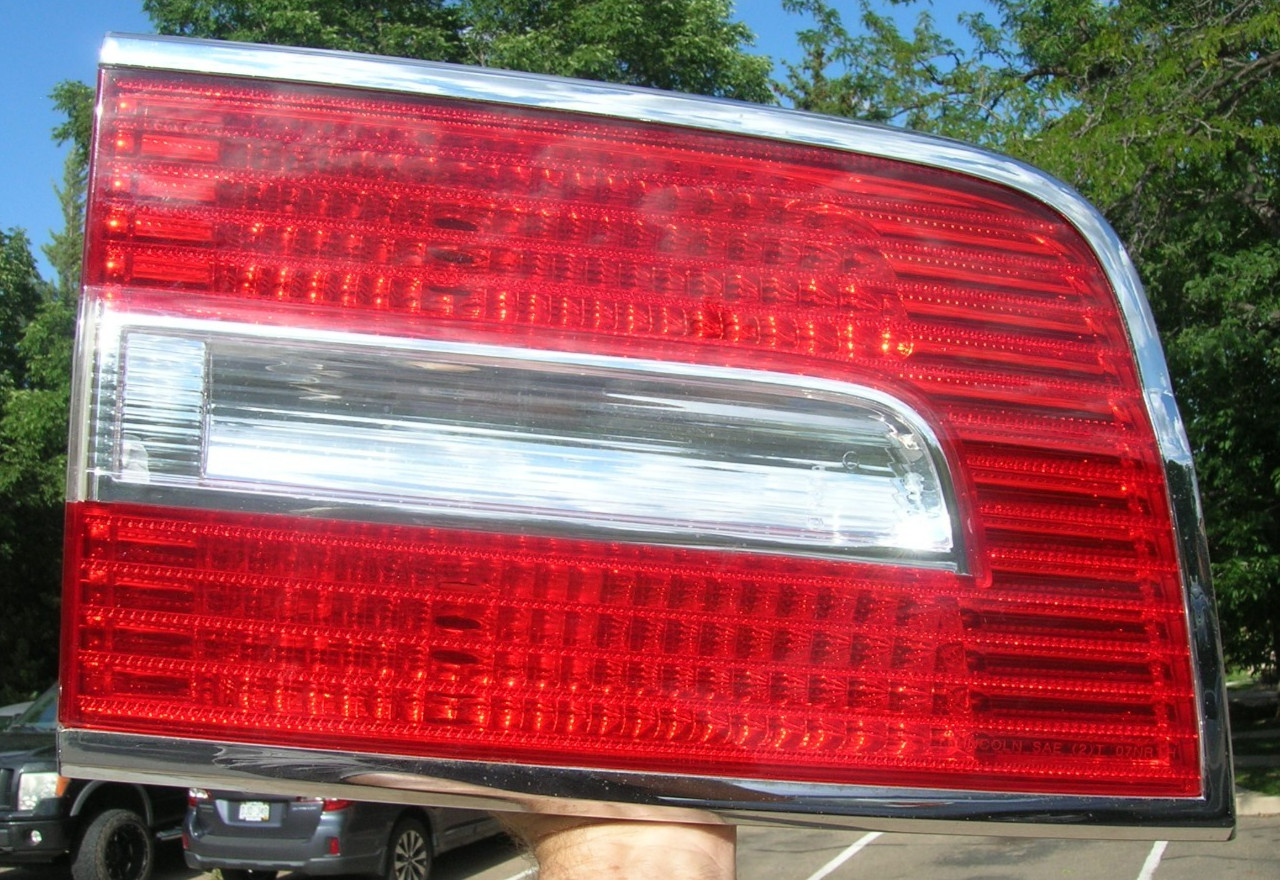07-14 Lincoln Navigator Left Rear Drivers Inner Tail Light Lens OEM U FIX 2 TABS