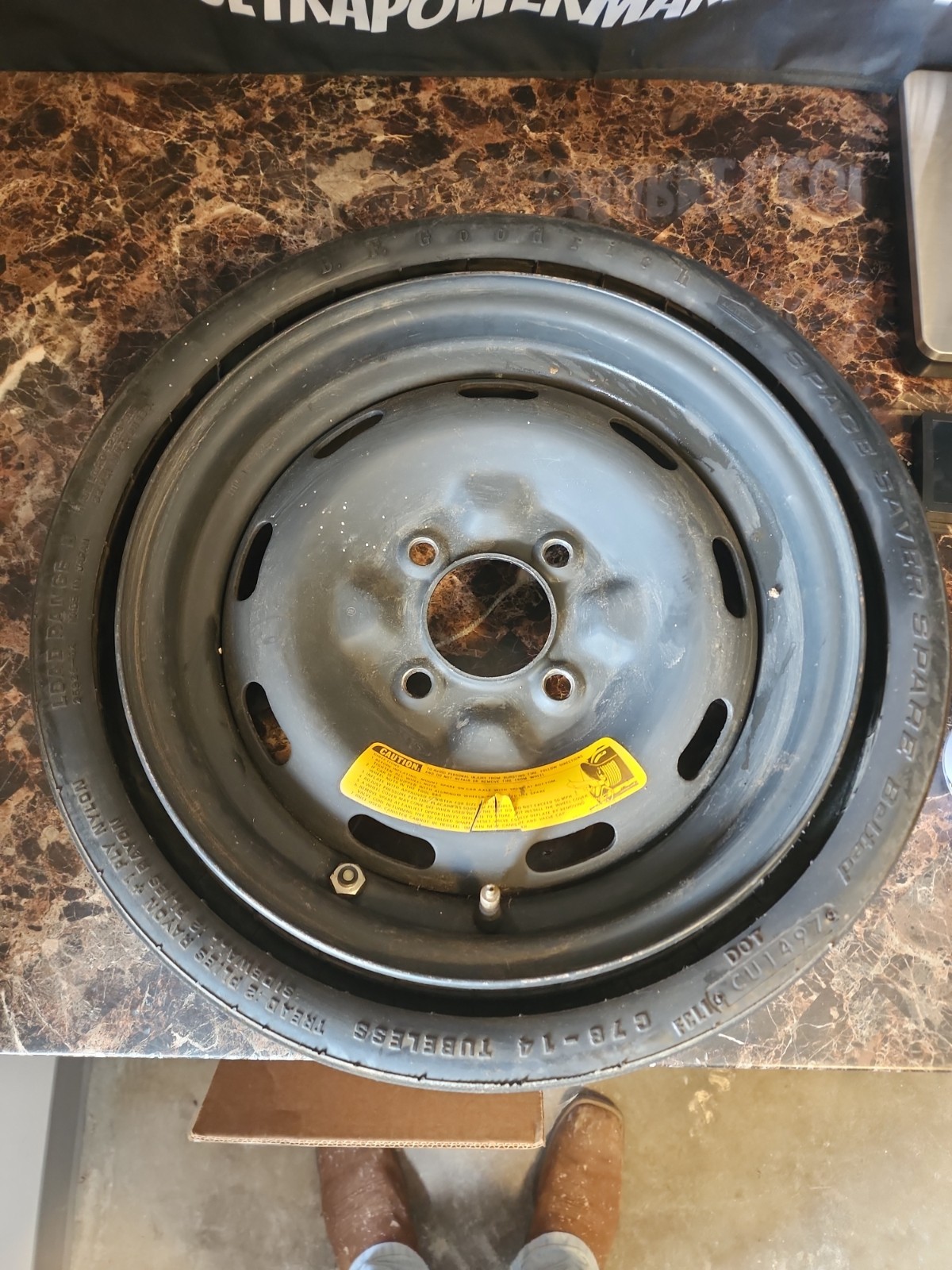77-78 Datsun 280Z space saver compact spare tire OEM used 77-78 Datsun 280Z space saver compact spare tire OEM used
