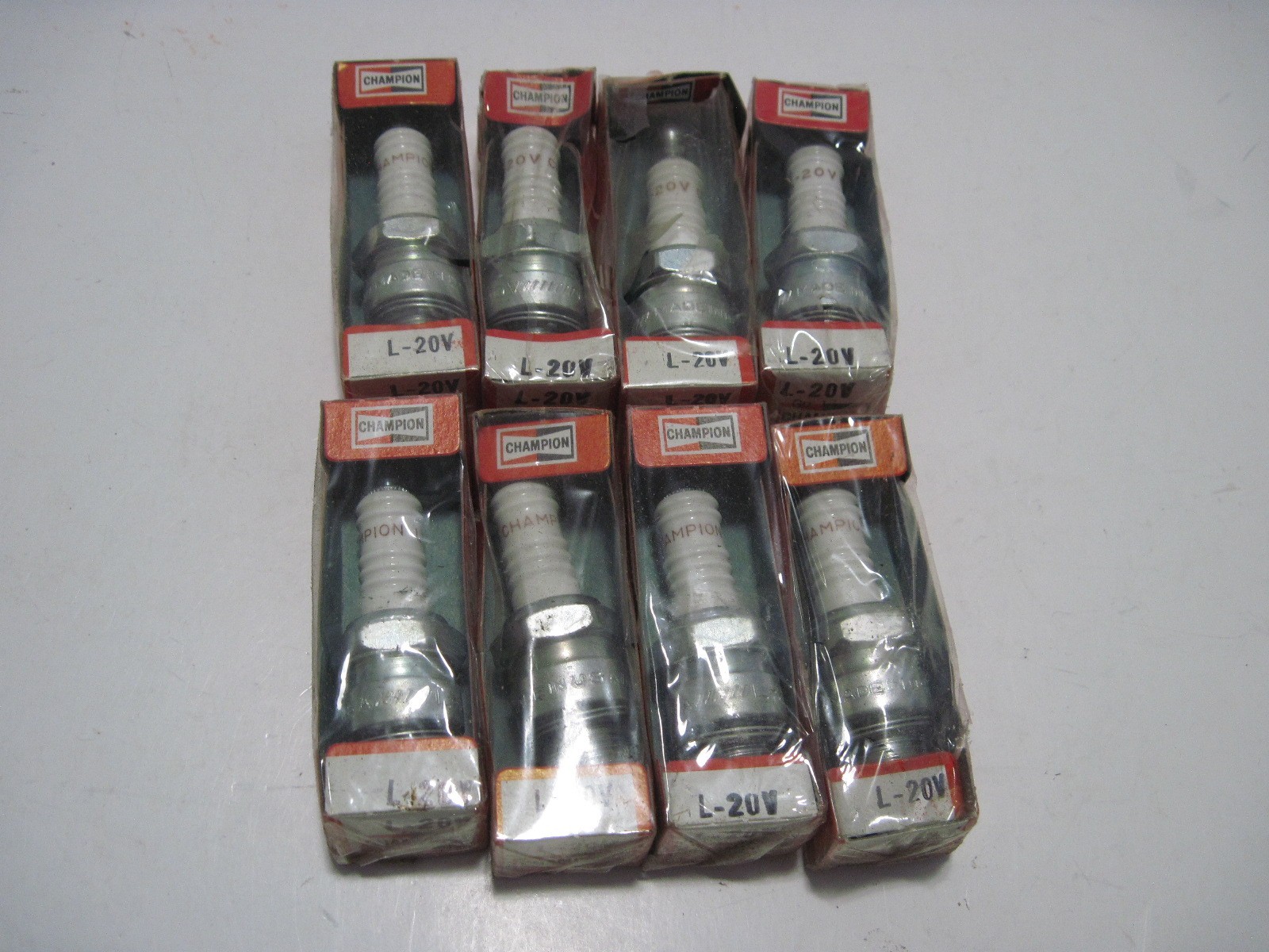 NOS (8) Champion L-20V Spark Plugs for Mercury, Evinrude, Kawasaki