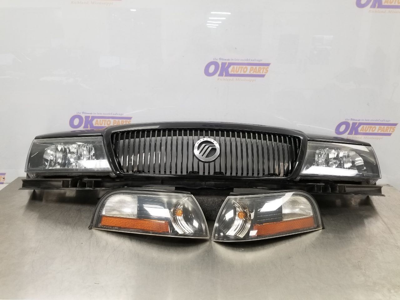 03 MERCURY MARAUDER HEADER PANEL BLACK UA GRILLE, HEADLIGHT AND FOG LAMP SET