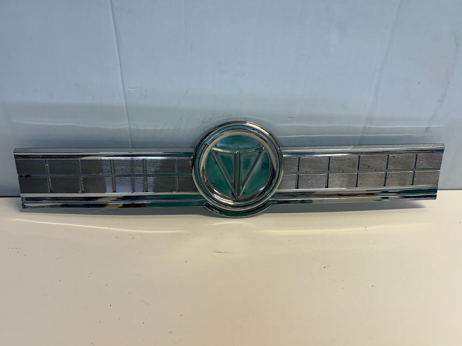 1964-66 Plymouth Barracuda Valiant Trunk Panel Trim Molding Emblem used 1964-66 Plymouth Barracuda Valiant Trunk Panel Trim Molding Emblem used