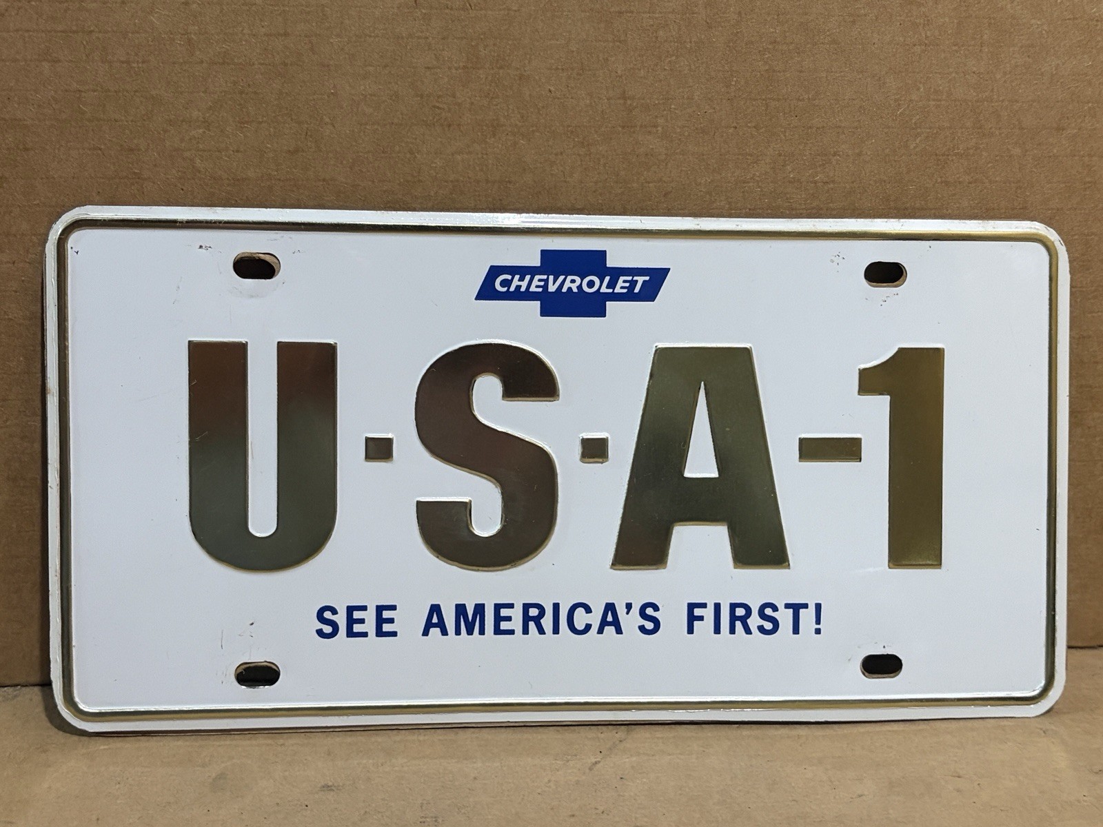 1960s Chevrolet USA-1 Steel License Plate With Cardboard Backing - NICE SHAPE