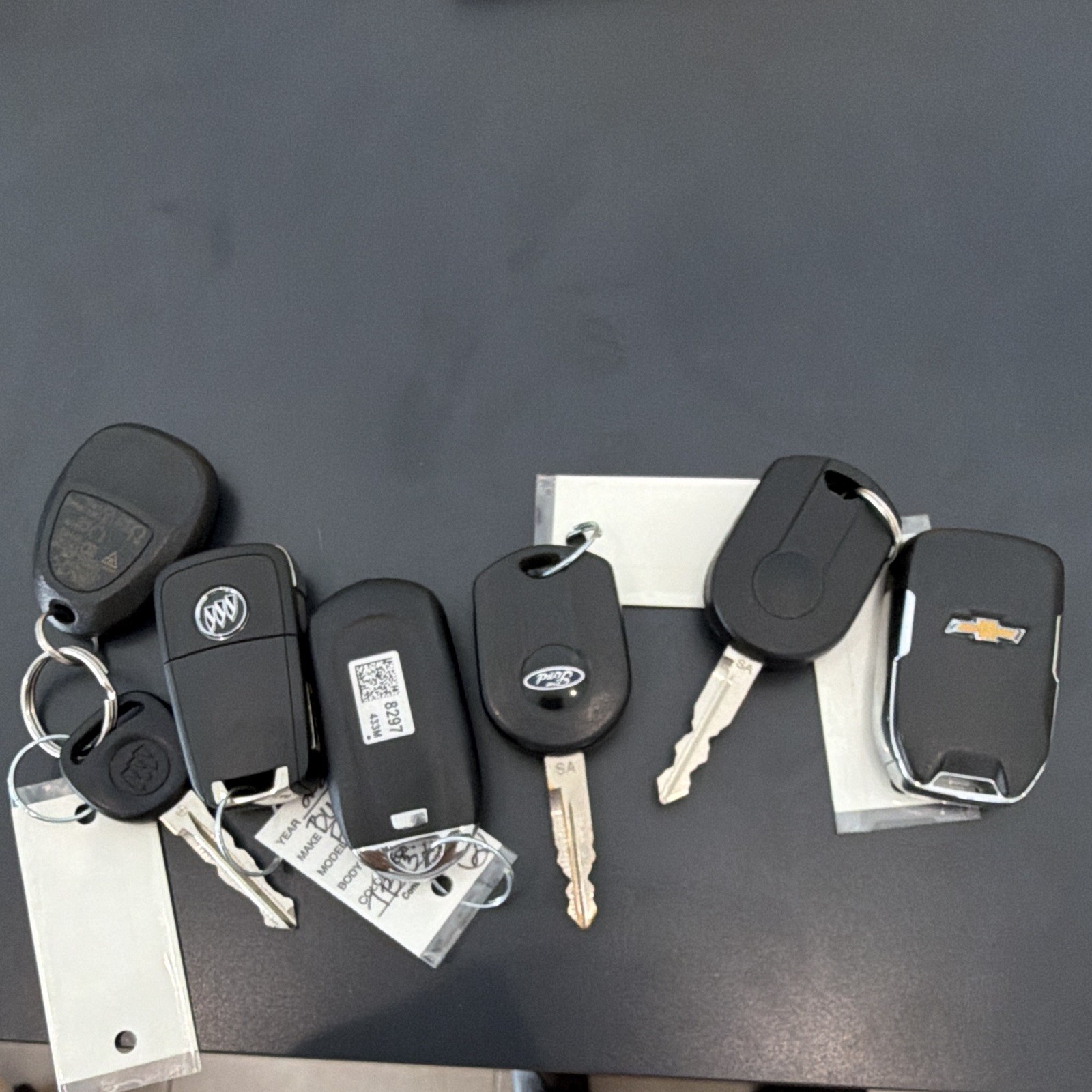 Used LOT OF OEM KEY FOBS BUICK FORD Used LOT OF OEM KEY FOBS BUICK FORD