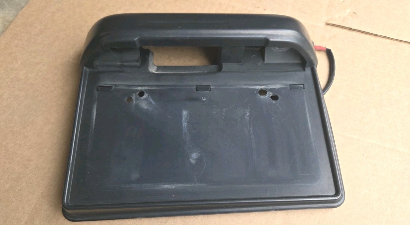 1999-2004 Suzuki Vitara Tracker XL7 Rear Trunk License Plate Holder Molding Trim 1999-2004 Suzuki Vitara Tracker XL7 Rear Trunk License Plate Holder Molding Trim