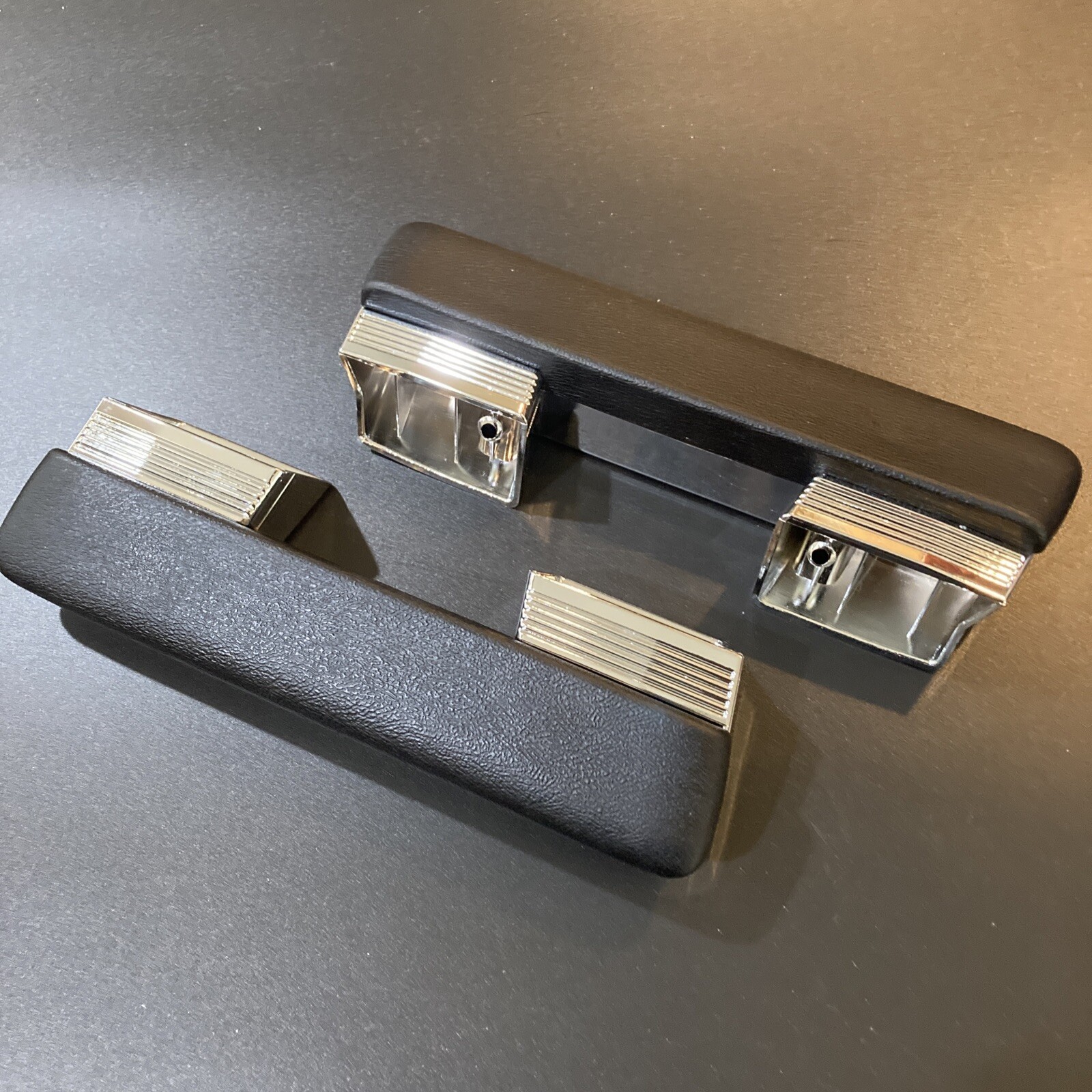 1964 1965 1966 1967 A Body Chrome Front Arm Rest Bases and Black Pads Assembly 1964 1965 1966 1967 A Body Chrome Front Arm Rest Bases and Black Pads Assembly