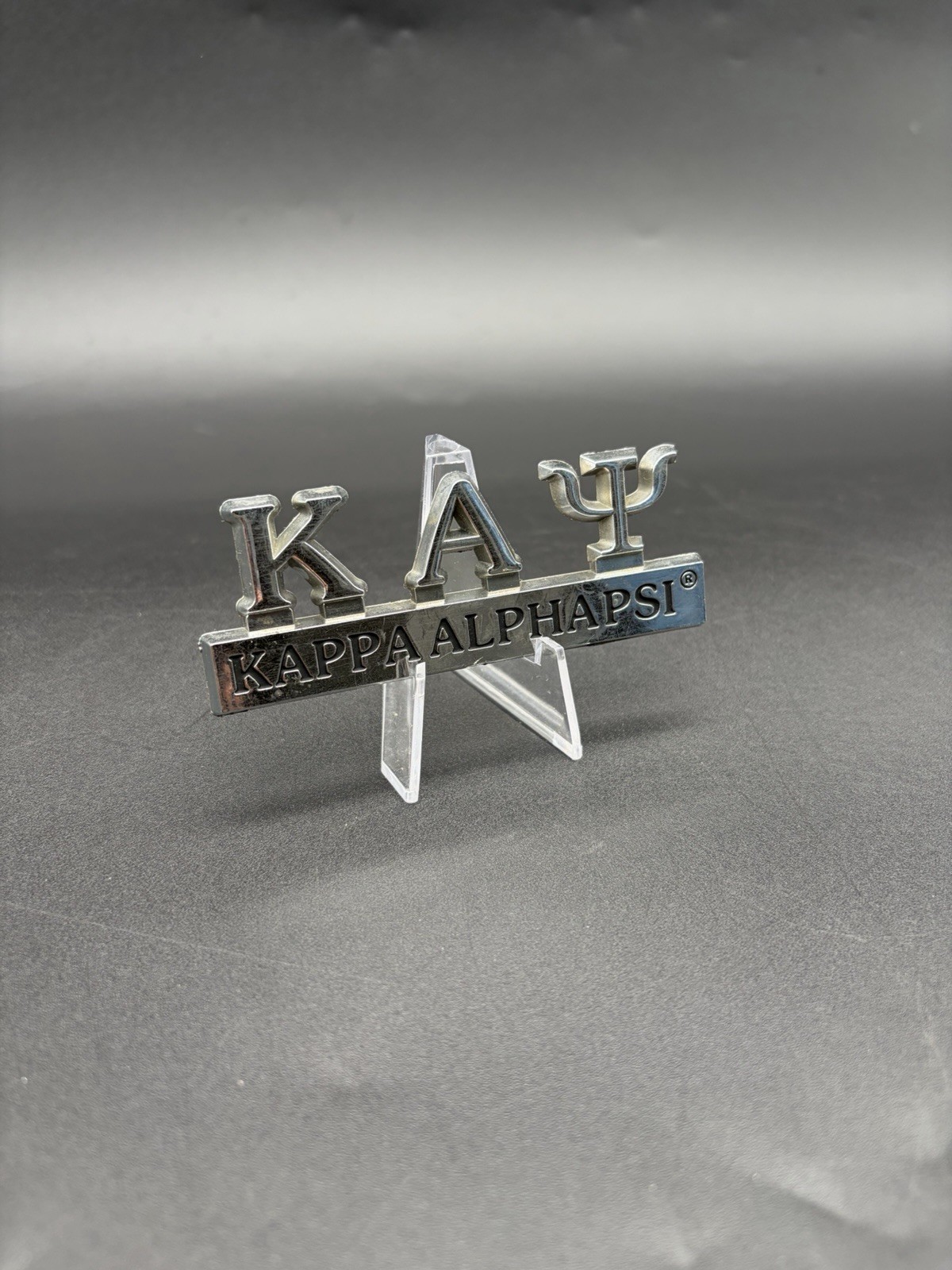 Kappa Alpha Psi Plastic Auto Emblem Badge - Silver Tone Fraternity Crest