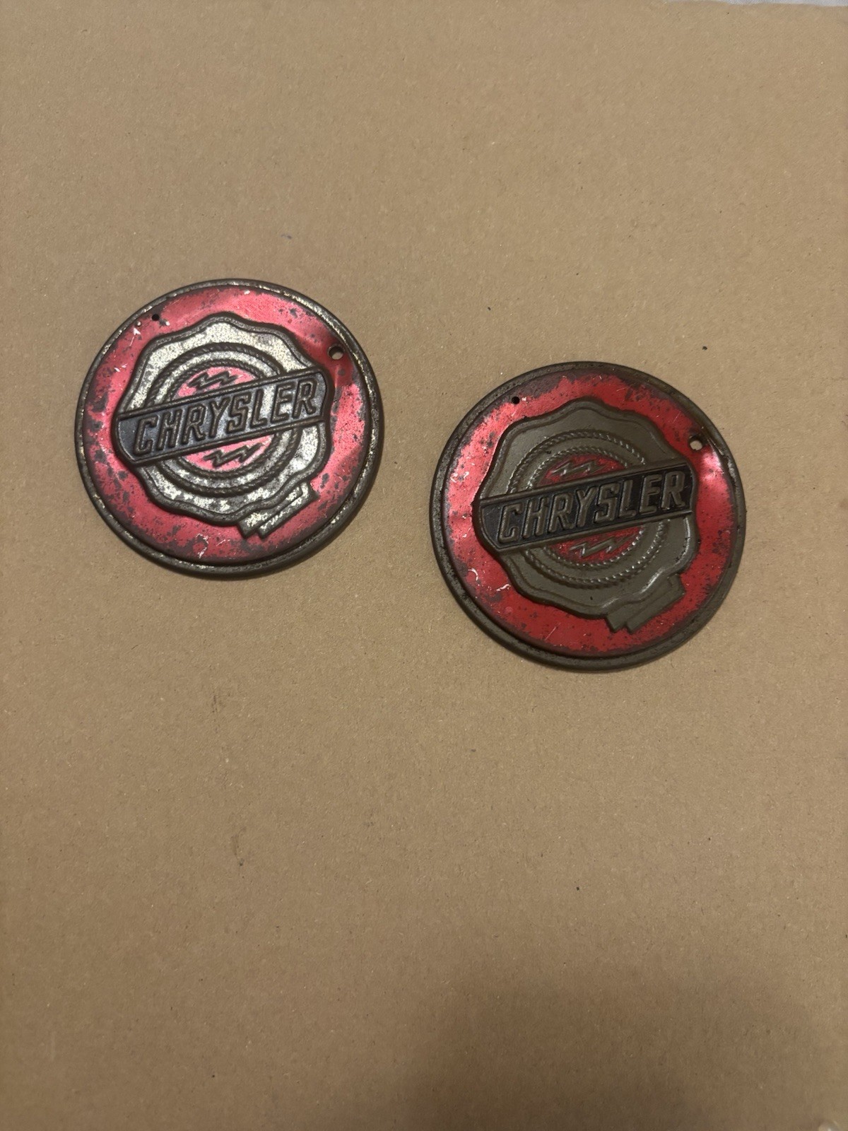 Pair of original 1938 Chrysler front bumper emblems Pair of original 1938 Chrysler front bumper emblems