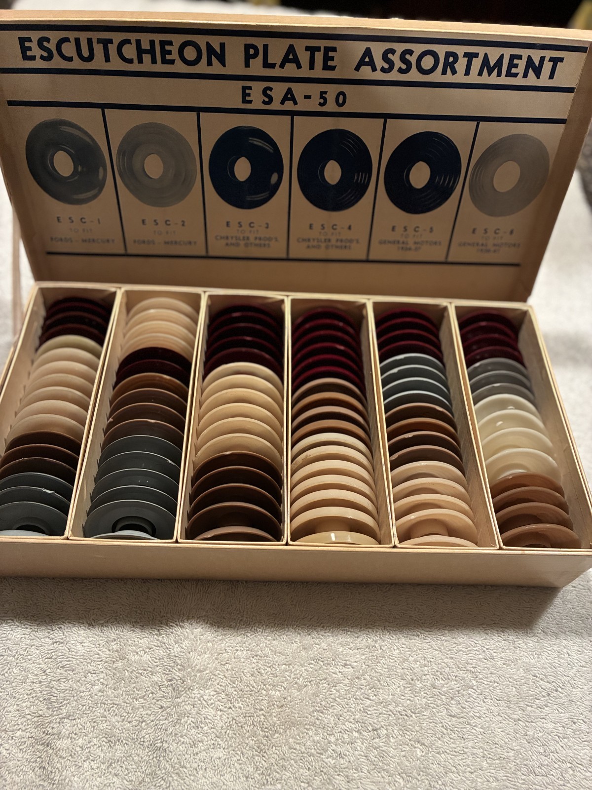NOS 1941 Escutcheon Plate Assortment-Complete 100 Piece for Ford Chrysler GM Ind