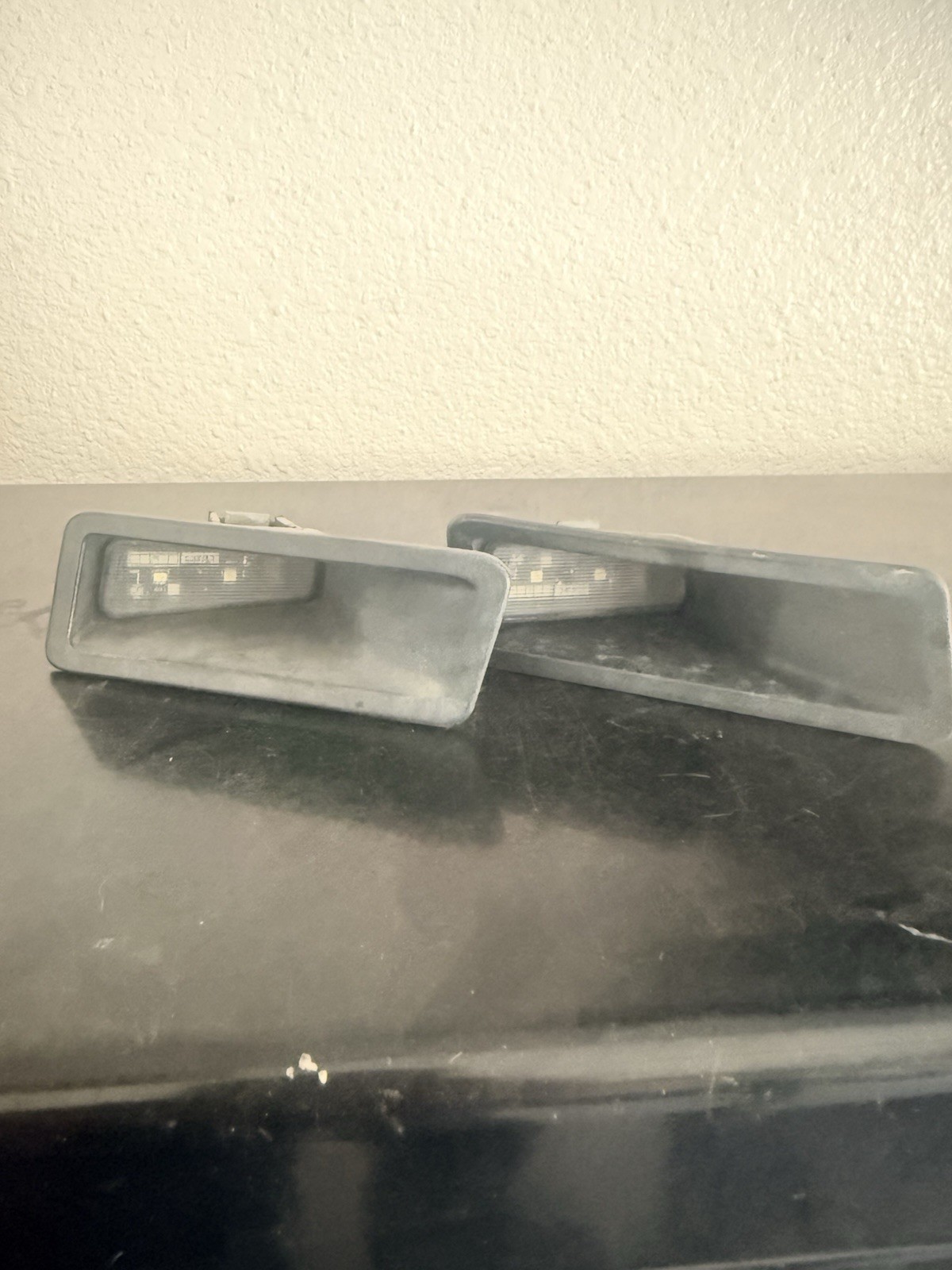 OEM 2019-2025 Ram 1500 Rear Bumper LED License Plate Light Housing Pair Set