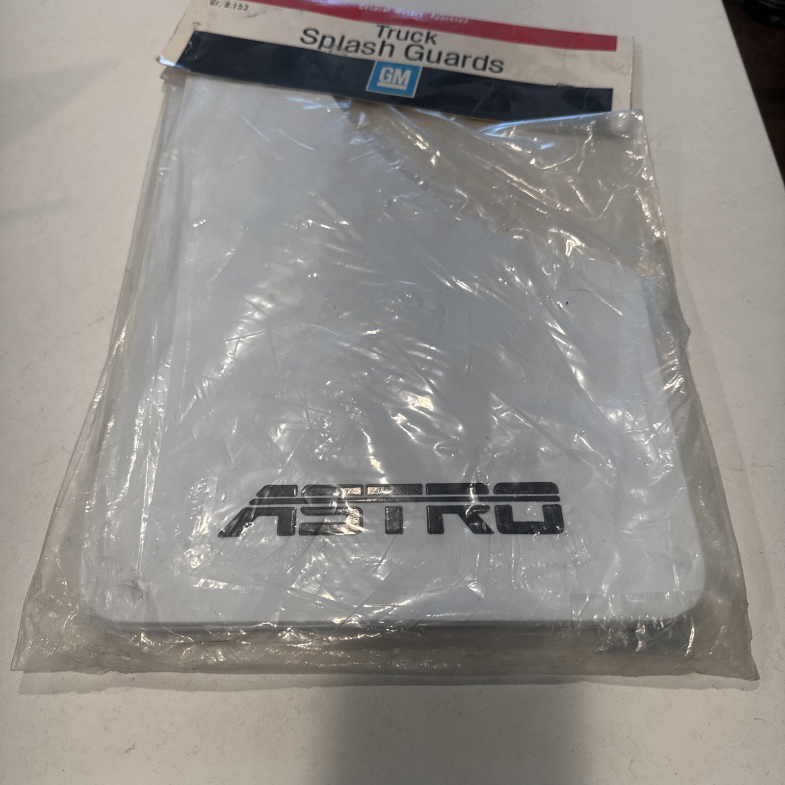 NOS New OEM 1985-1993 Chevrolet Astro Van White Mud Flaps Splash Guards