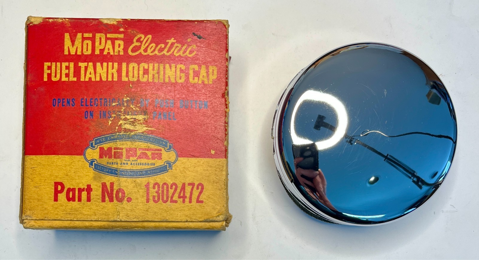 New Old Stock Electric Locking Fuel Cap for 1940-49 DPCD Models Mopar #1302472 New Old Stock Electric Locking Fuel Cap for 1940-49 DPCD Models Mopar #1302472