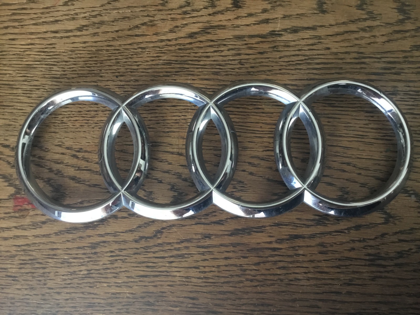 2019-2024 AUDI FRONT GRILLE EMBLEM SILVER CHROME 4KE853605 OEM