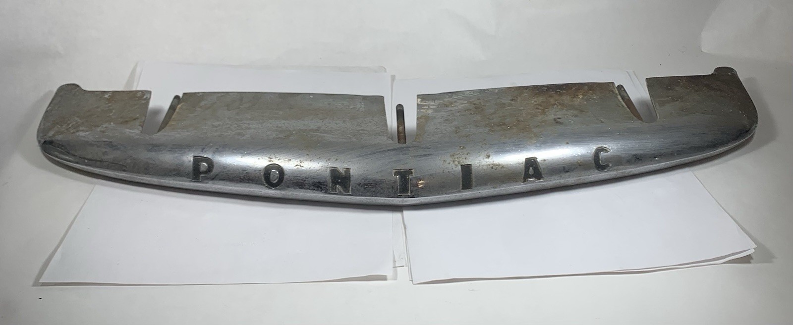 Vtg 1953 Pontiac Chieftain chrome center grille bar / hood lip trim overlay Vtg 1953 Pontiac Chieftain chrome center grille bar / hood lip trim overlay