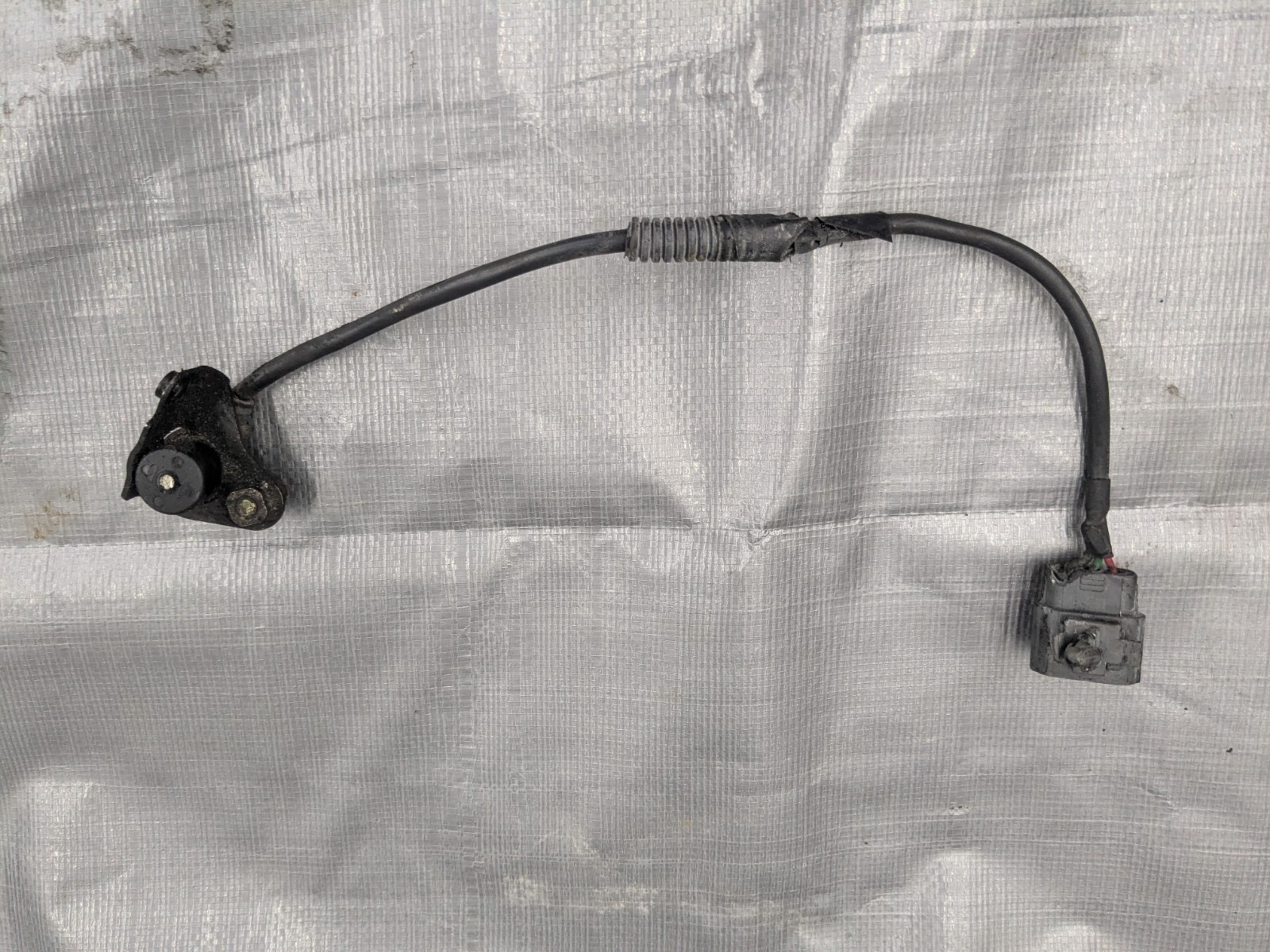 95.5-97 Mazda Miata OEM Crank Pickup Sensor Mount Oil Pump Bracket B6BF-14-190