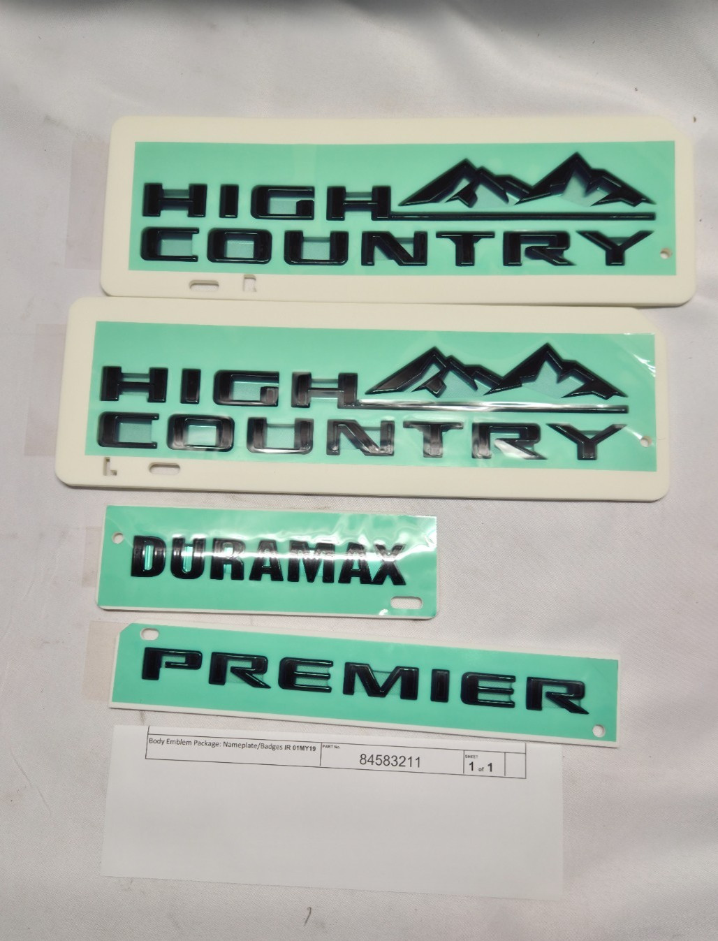 NEW OEM 21-26 Tahoe Suburban High Country Duramax Premier Emblem Kit 86533390