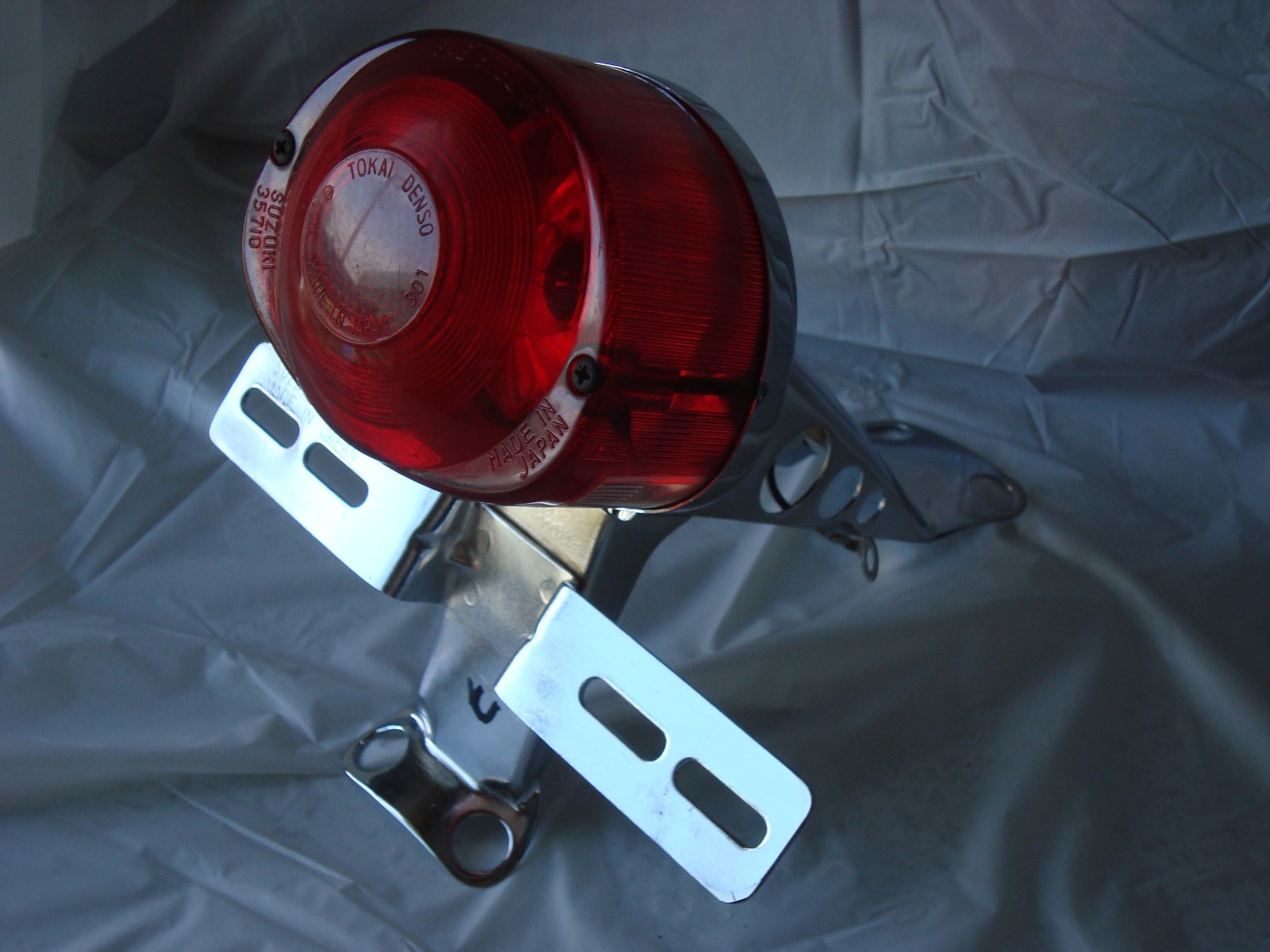 SUZUKI BRAKE LIGHT USED VERY NICE 35710 ROUND LENS DENZO