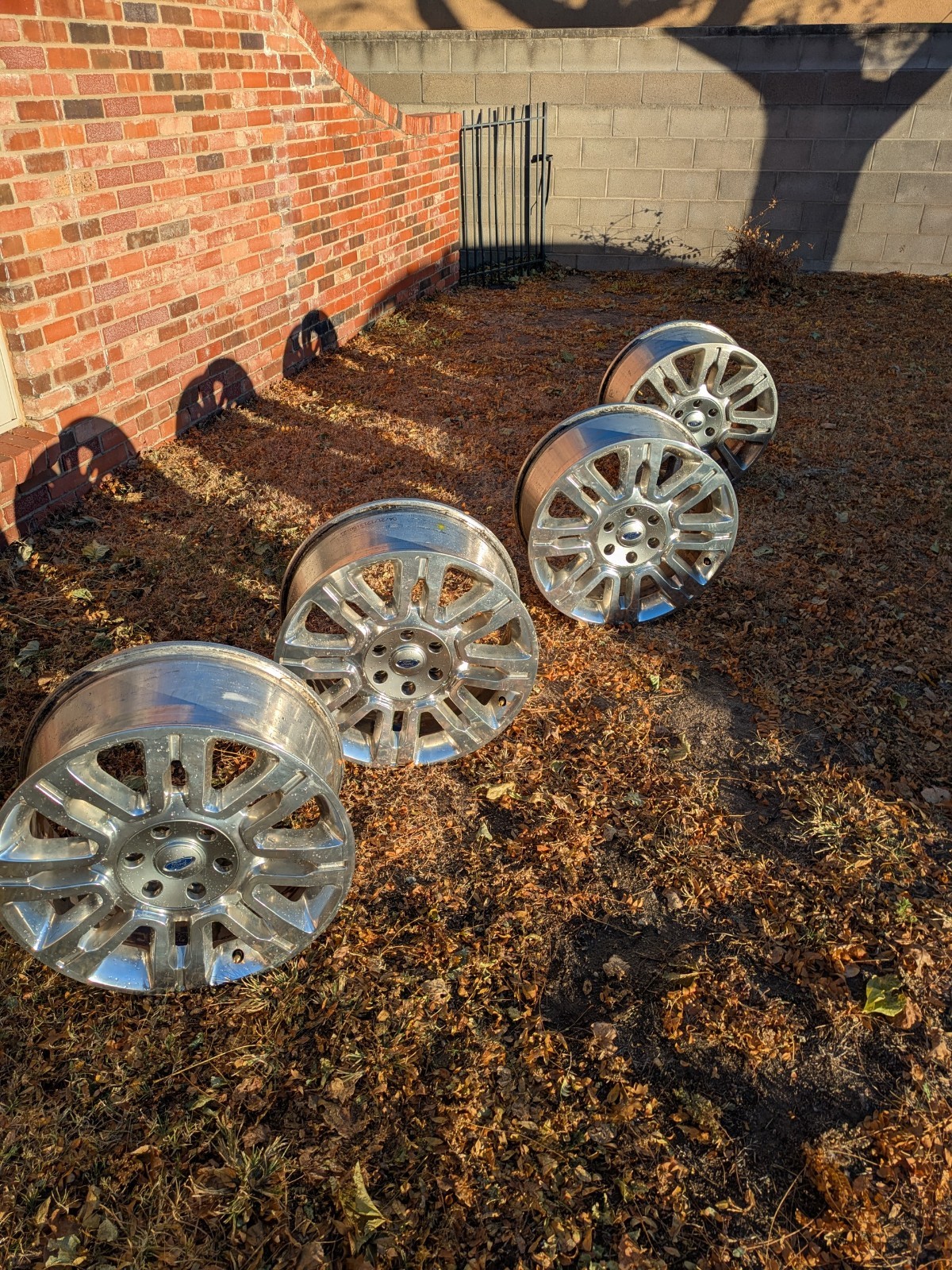 Aluminum alloy wheels, set of 4. Three look great, one has a crack.