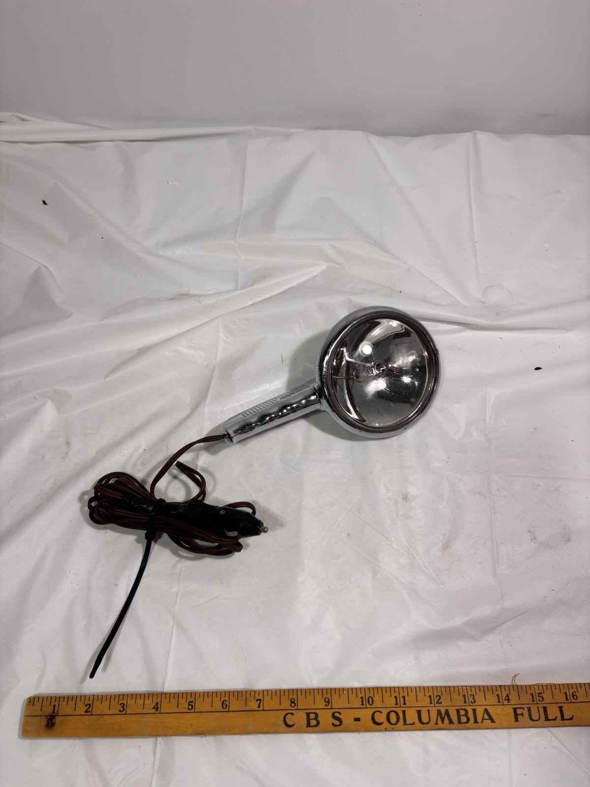 vintage chrome 12-volt handheld automotive spotlight, produced By GE