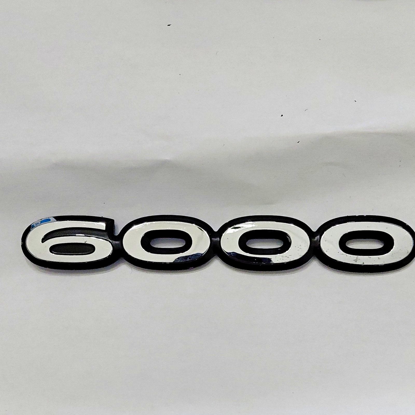 NOS OEM 1985-1991 PONTIAC 6000 REAR TRUNK EMBLEM BADGE SYMBOL LOGO SIGN NOS OEM 1985-1991 PONTIAC 6000 REAR TRUNK EMBLEM BADGE SYMBOL LOGO SIGN
