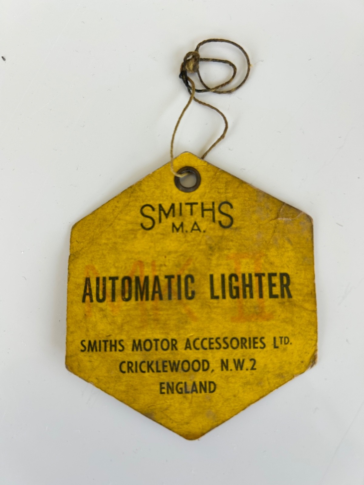 Smiths lighter tag for late Jaguar XK120 Smiths lighter tag for late Jaguar XK120