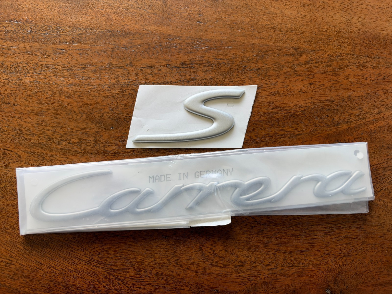 NEW Genuine Porsche Carrera S Emblem Insignia Logo Script Titanium 99755923701 NEW Genuine Porsche Carrera S Emblem Insignia Logo Script Titanium 99755923701